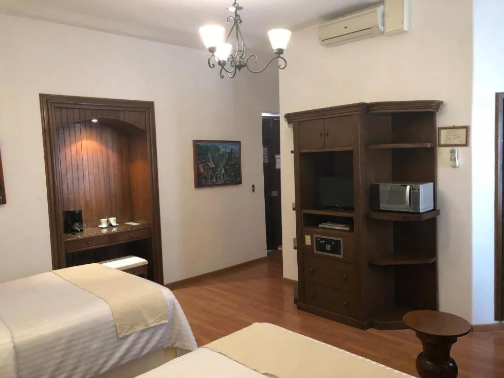 Bed in HOTEL MI SOLAR EJECUTIVO