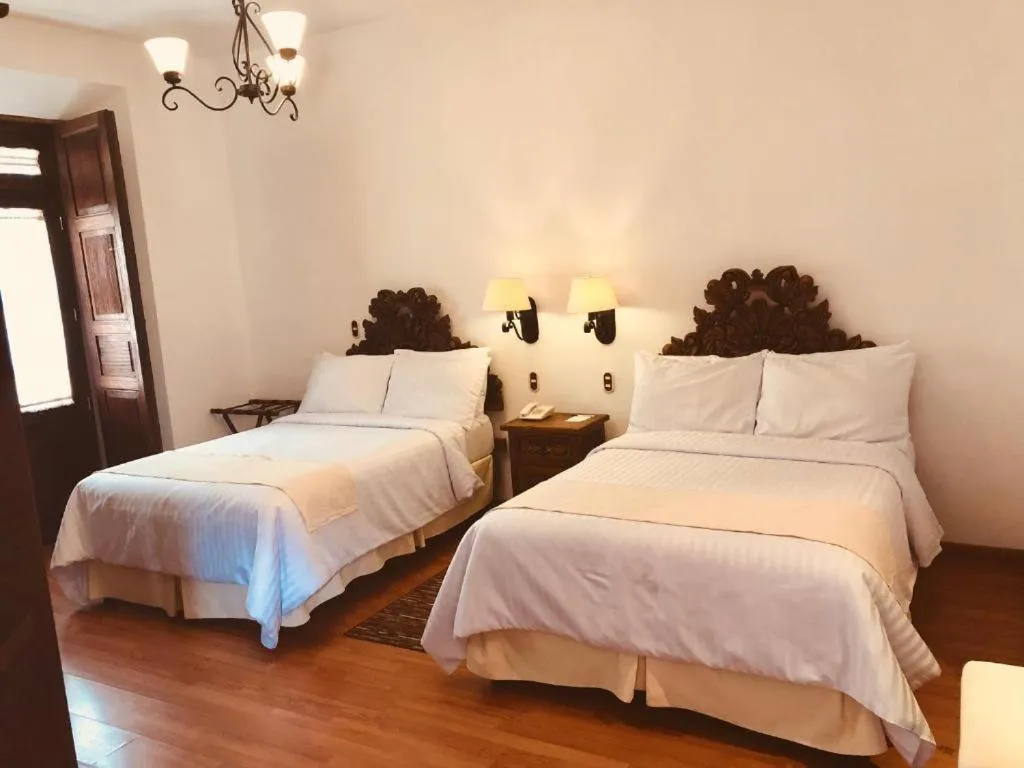 Bed in HOTEL MI SOLAR EJECUTIVO