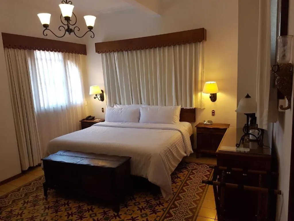 Bed in HOTEL MI SOLAR EJECUTIVO