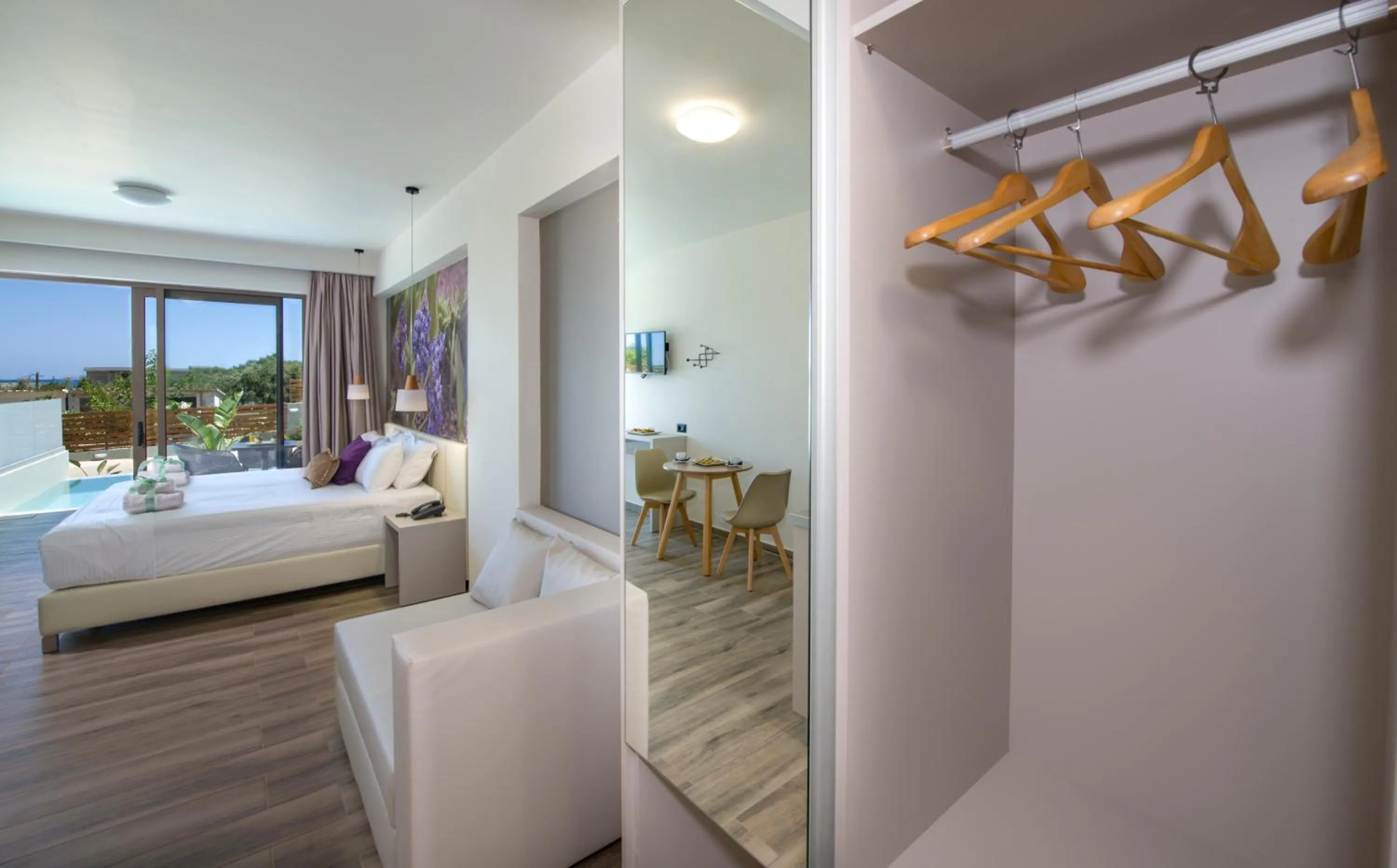 Living room, Bed in Incognito Creta Luxury Suites and More