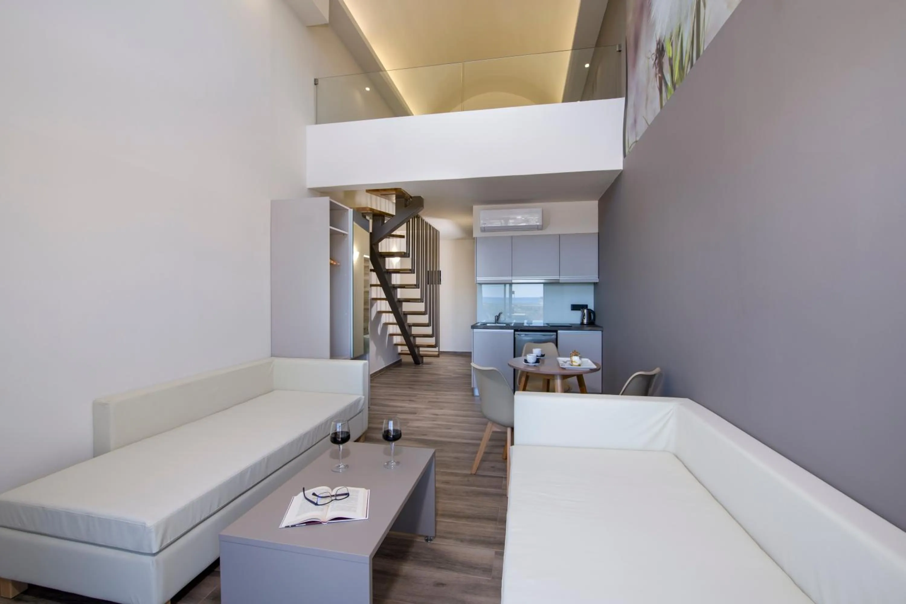 Living room, Bed in Incognito Creta Luxury Suites and More