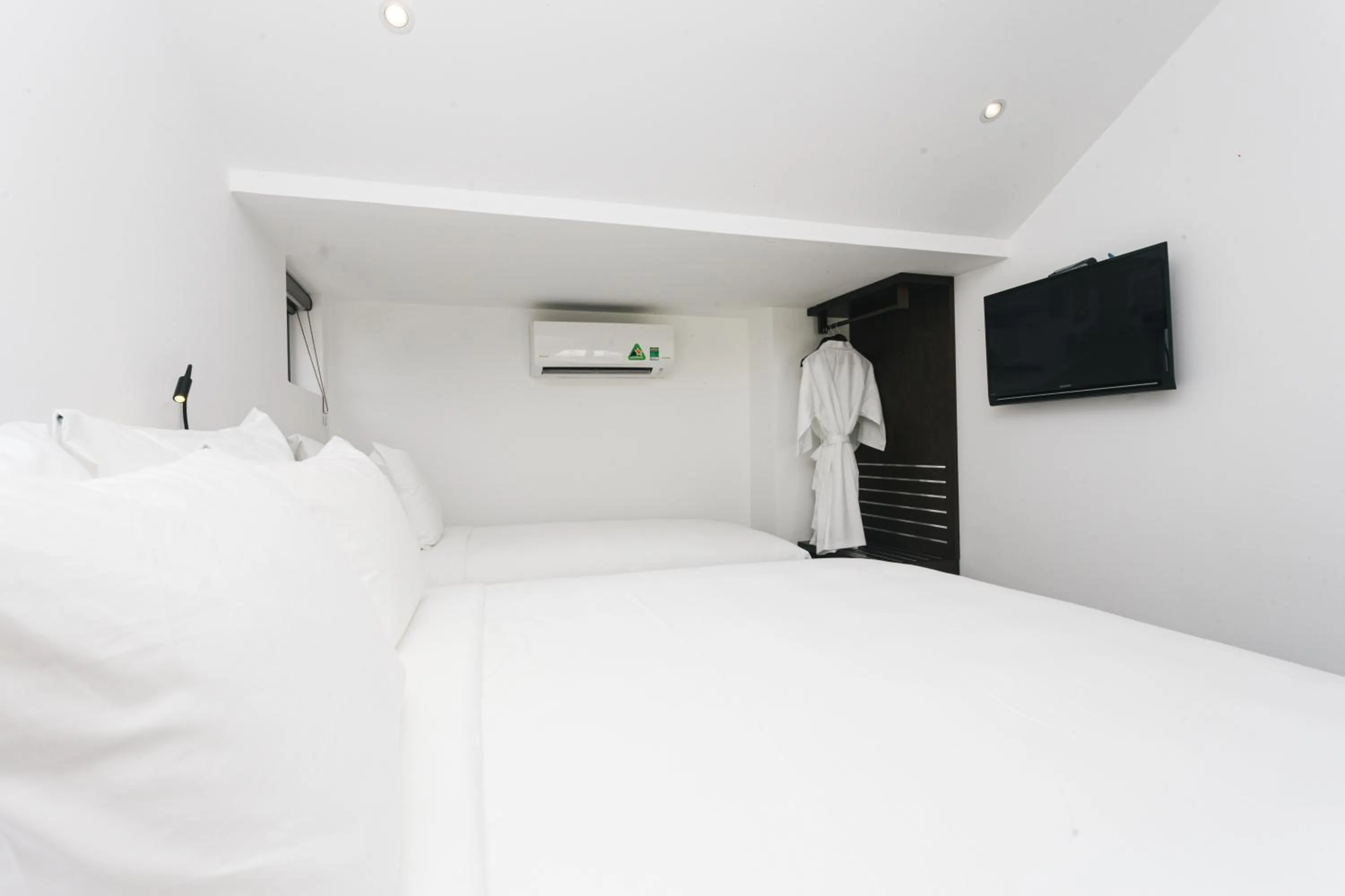 Bed in Le Petit Villa Hoi An