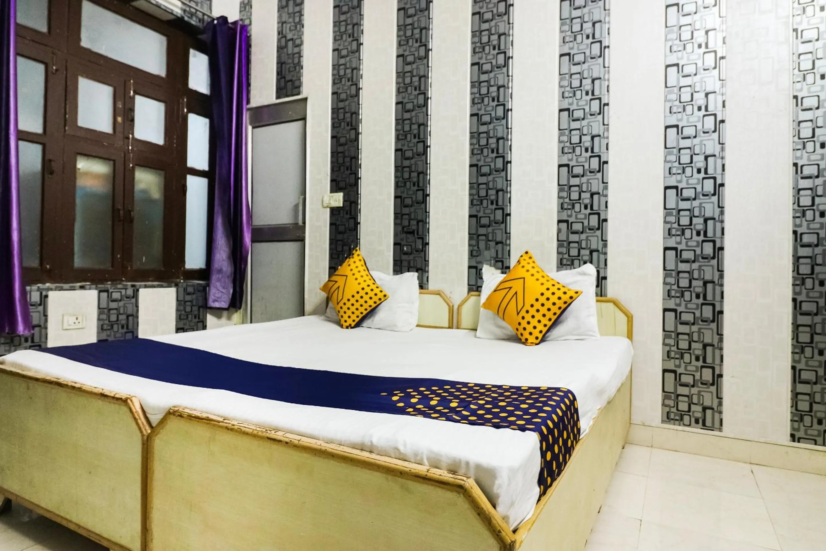 Bedroom in SPOT ON 67868 Hotel Gourav Regency