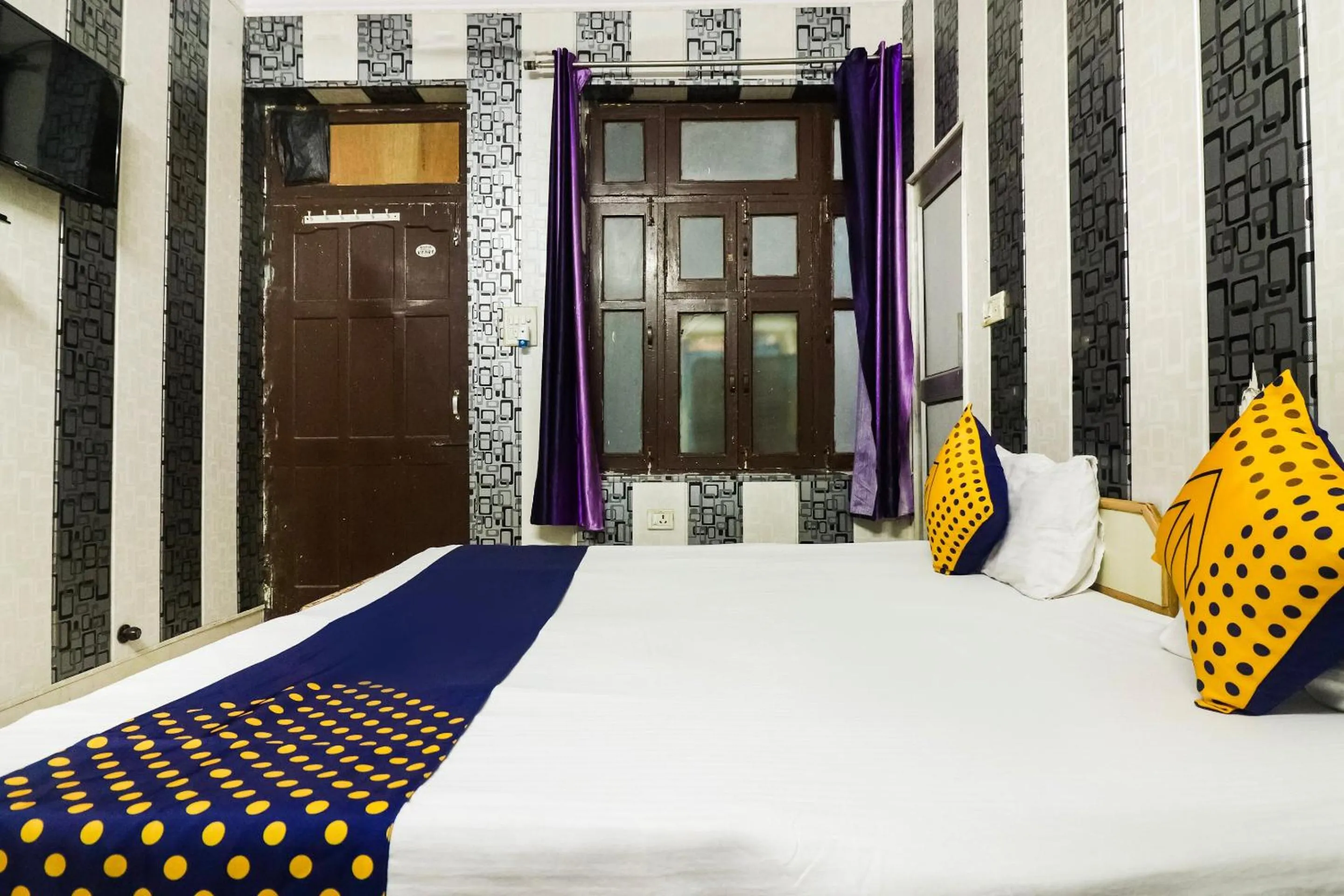 Bedroom in SPOT ON 67868 Hotel Gourav Regency