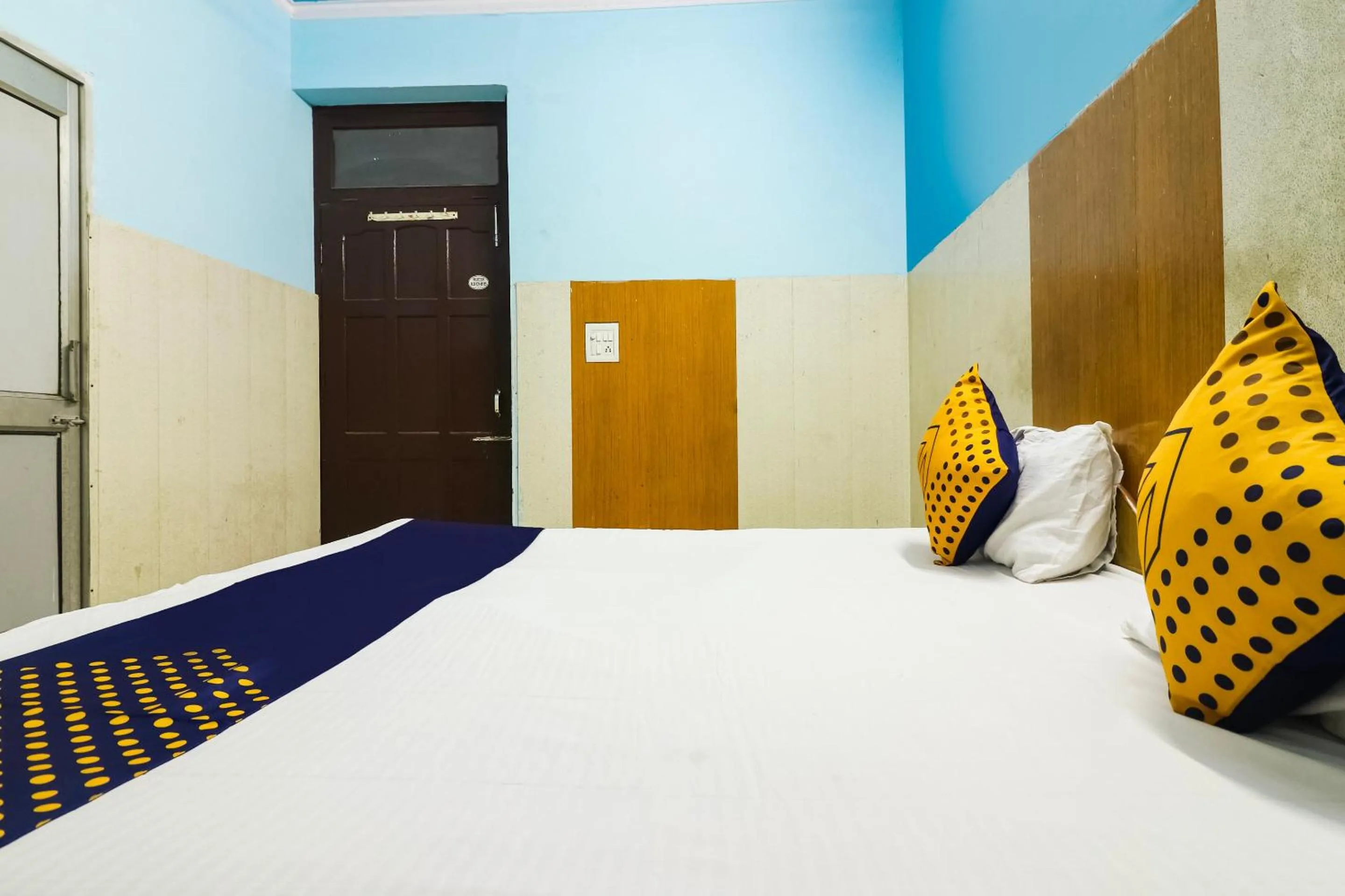 Bedroom in SPOT ON 67868 Hotel Gourav Regency