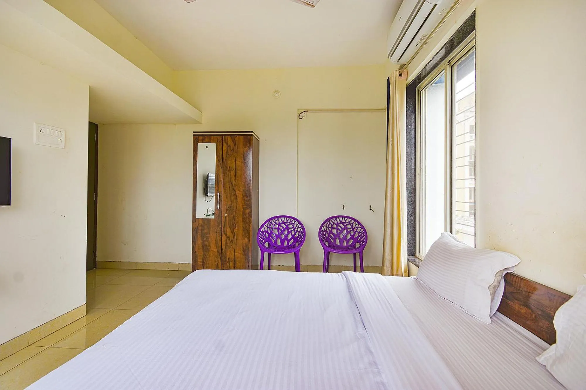 Bed in FabExpress Golden Leaf Airport