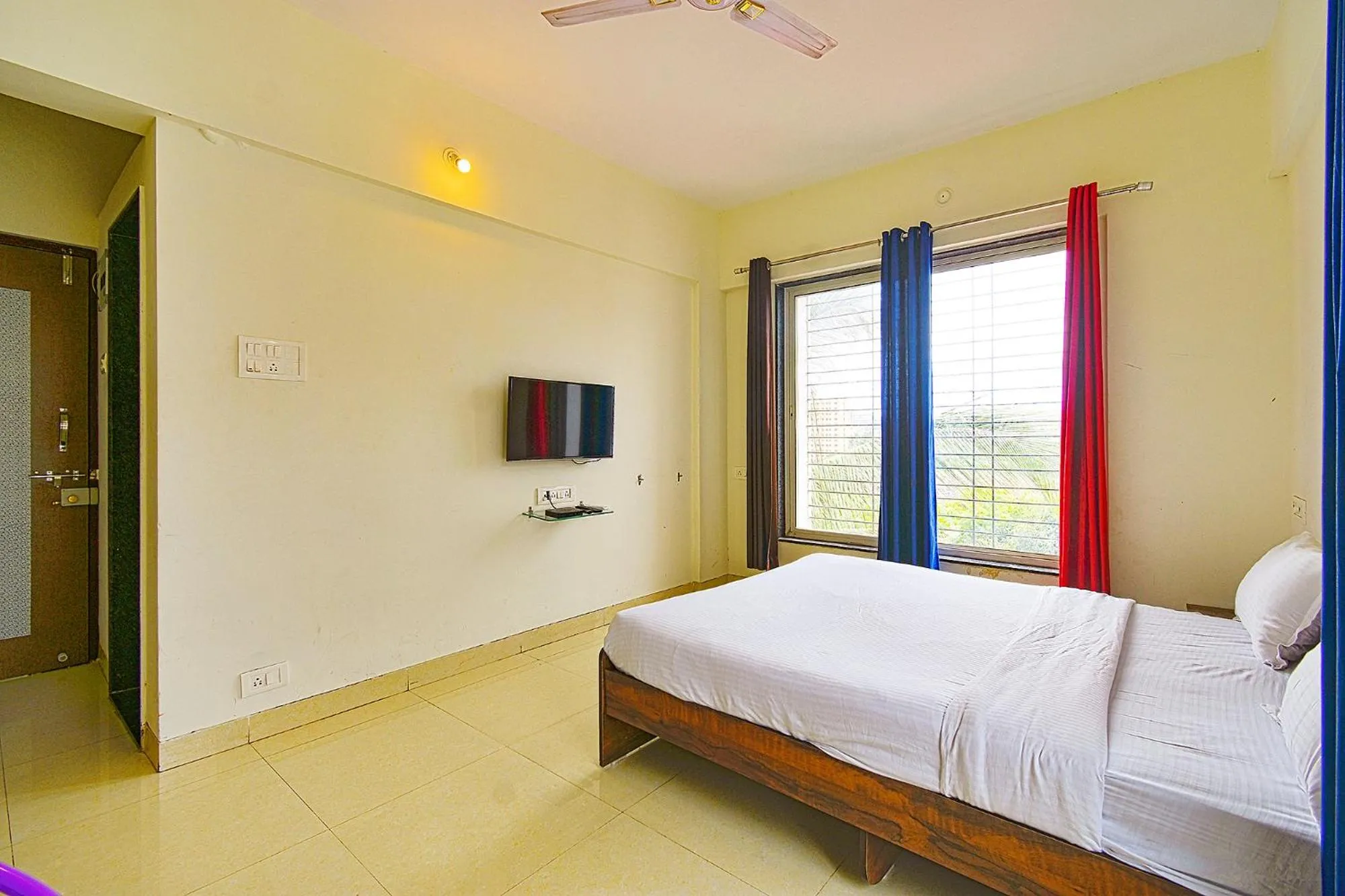 Bed in FabExpress Golden Leaf Airport