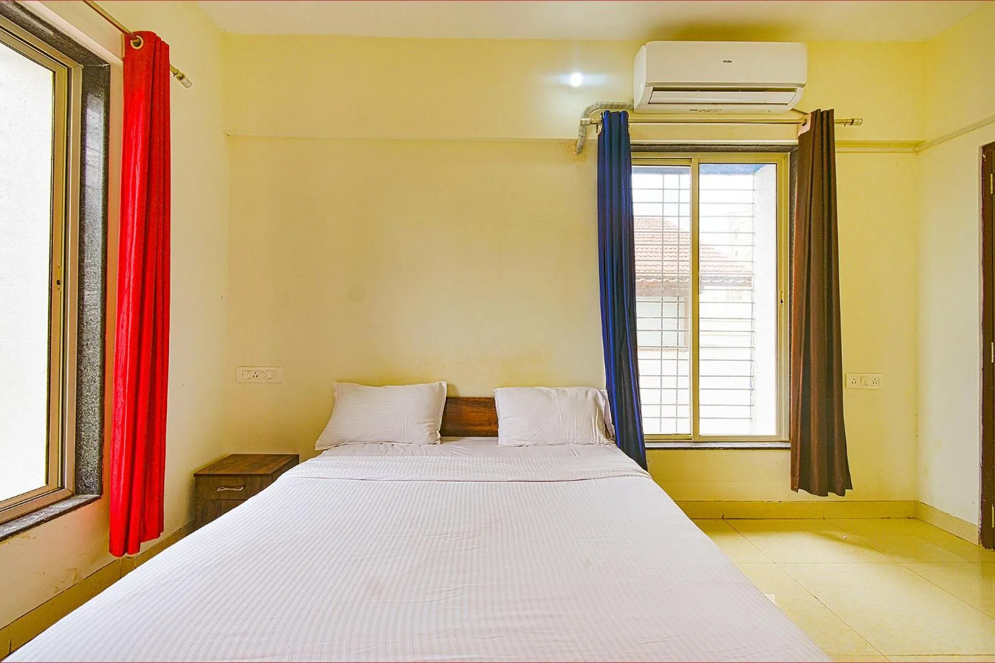 Bed in FabExpress Golden Leaf Airport