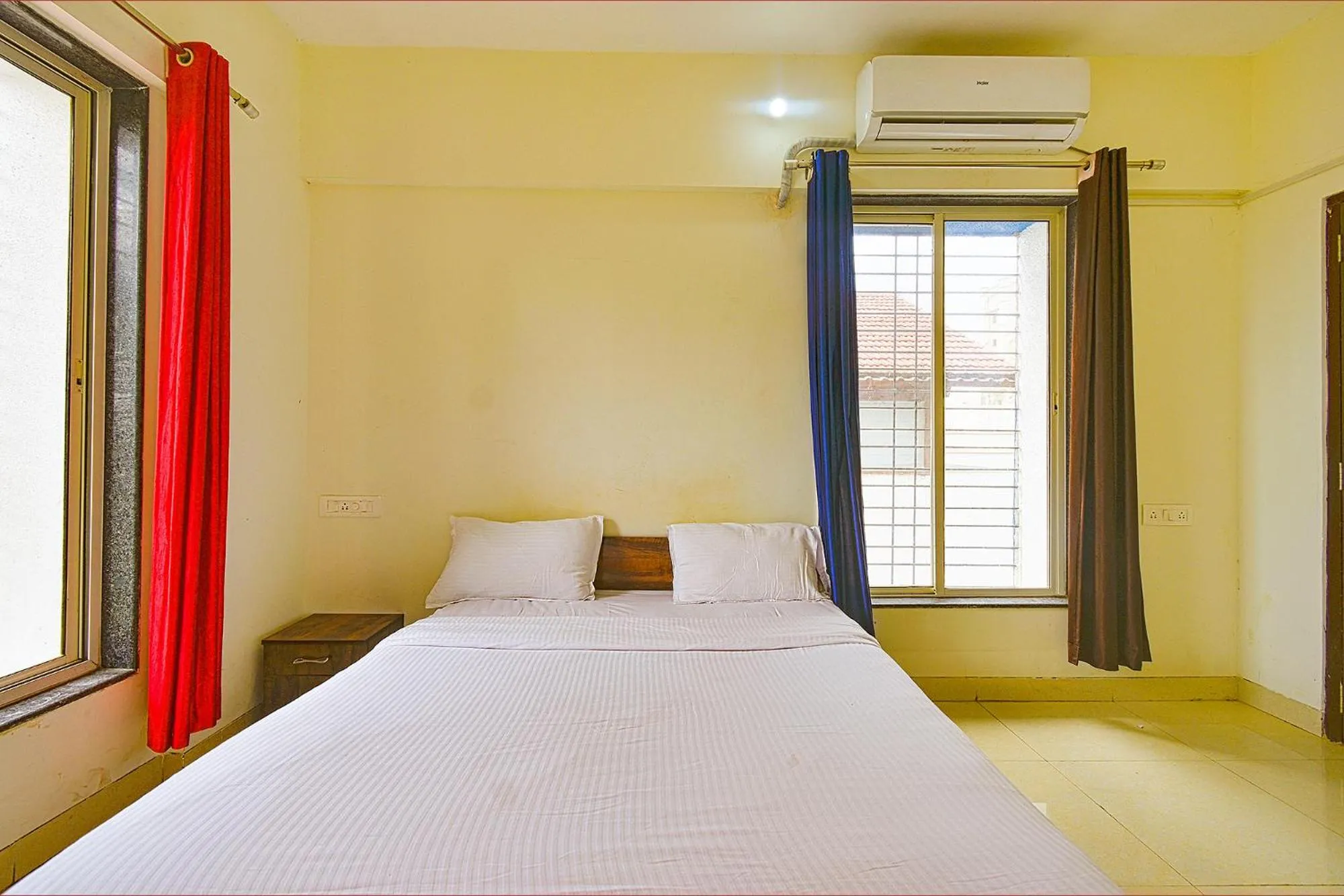 Bed in FabExpress Golden Leaf Airport