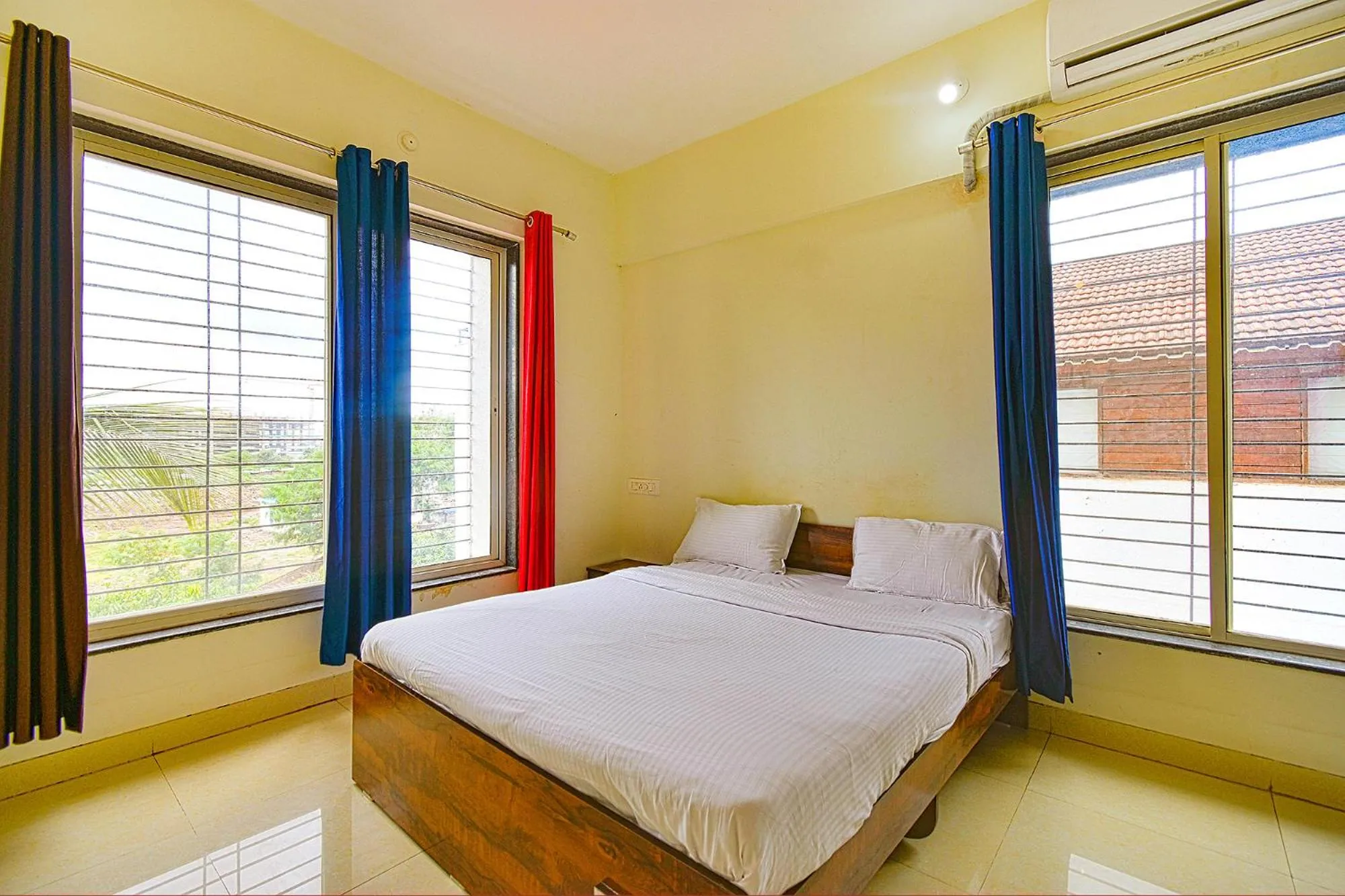 Bed in FabExpress Golden Leaf Airport