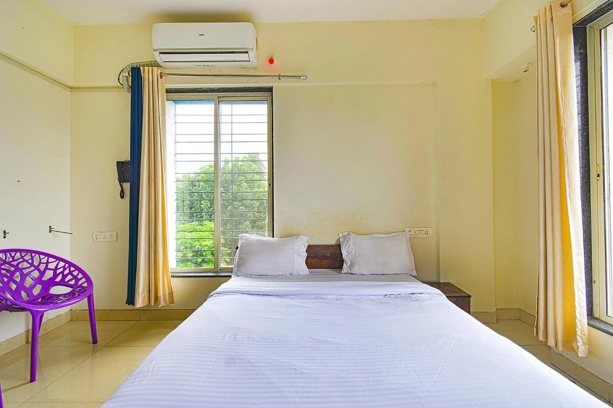 Bed in FabExpress Golden Leaf Airport