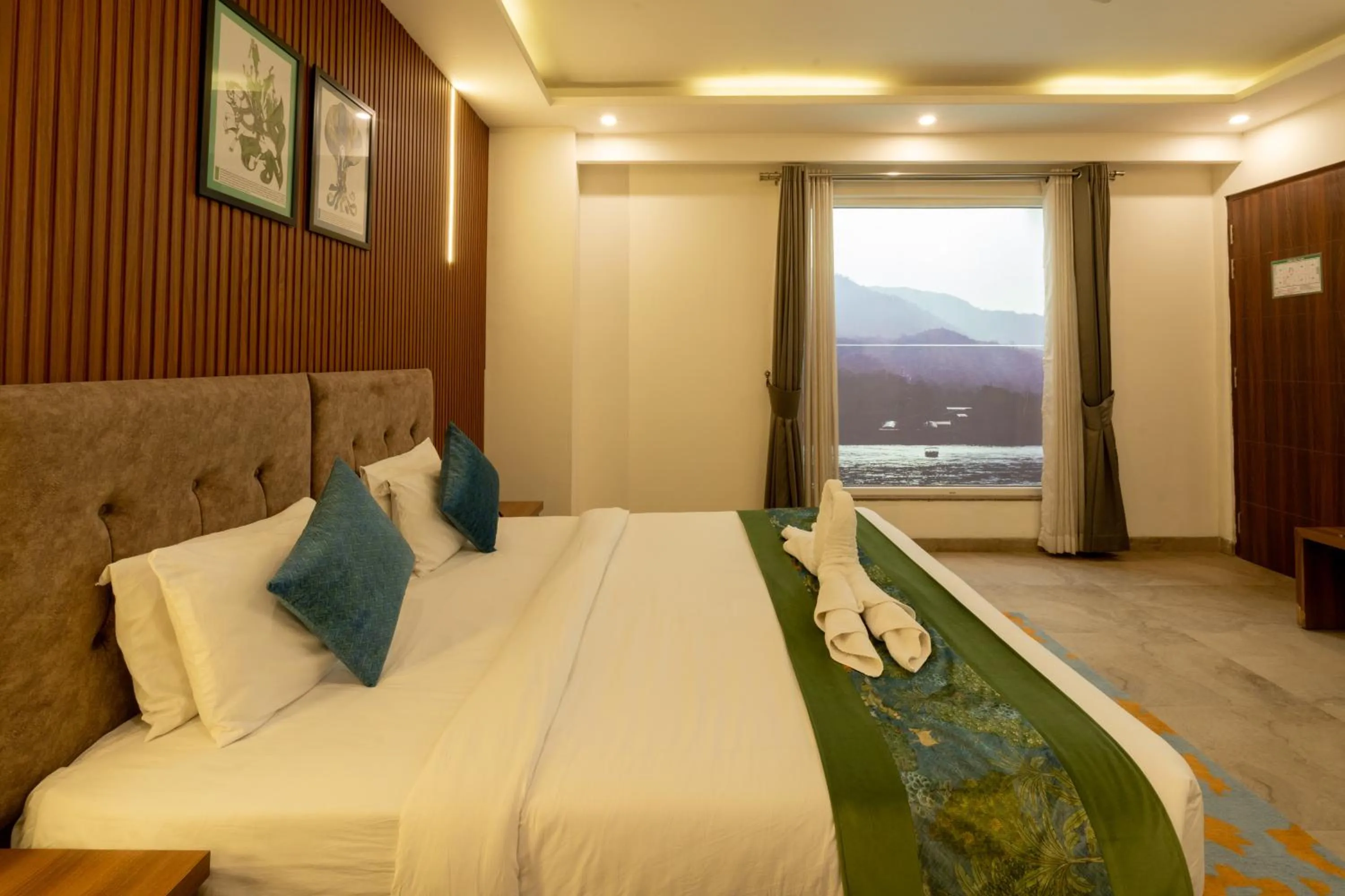 Bedroom, Bed in HOLYWATER Hotel by Ganga Kinare #150 mts from Ganga Ghat Rishikesh