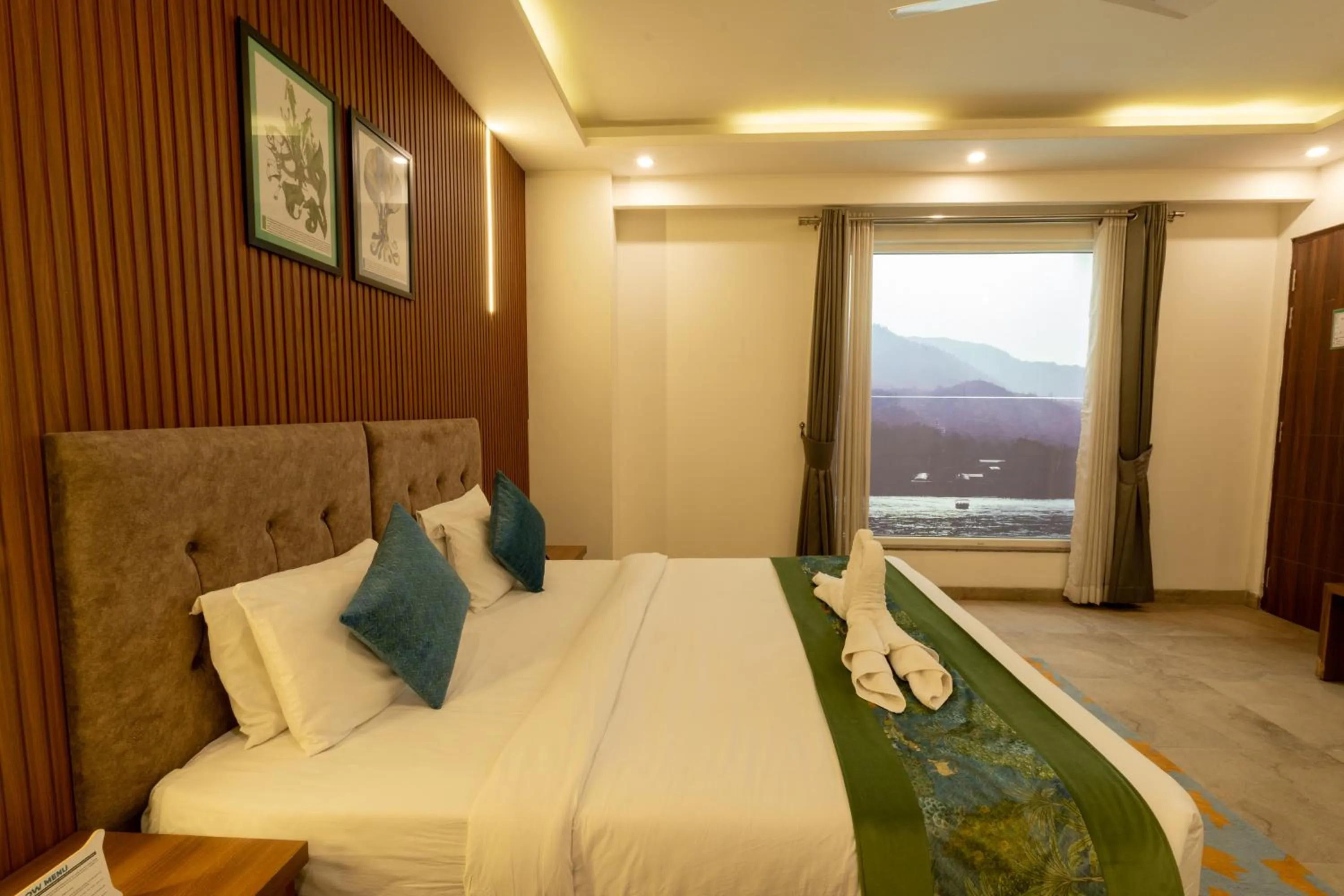 Bedroom, Bed in HOLYWATER Hotel by Ganga Kinare #150 mts from Ganga Ghat Rishikesh