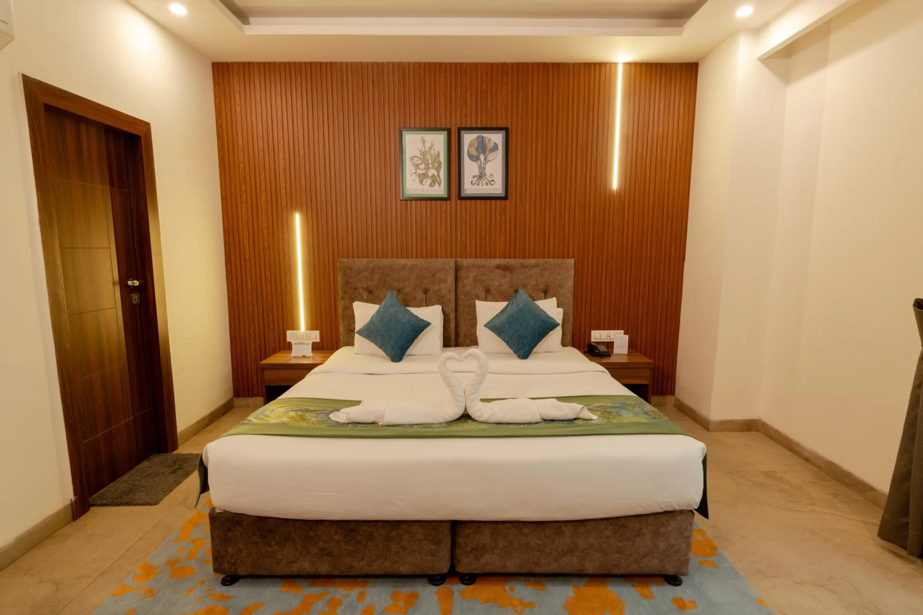 Bed in HOLYWATER Hotel by Ganga Kinare #150 mts from Ganga Ghat Rishikesh
