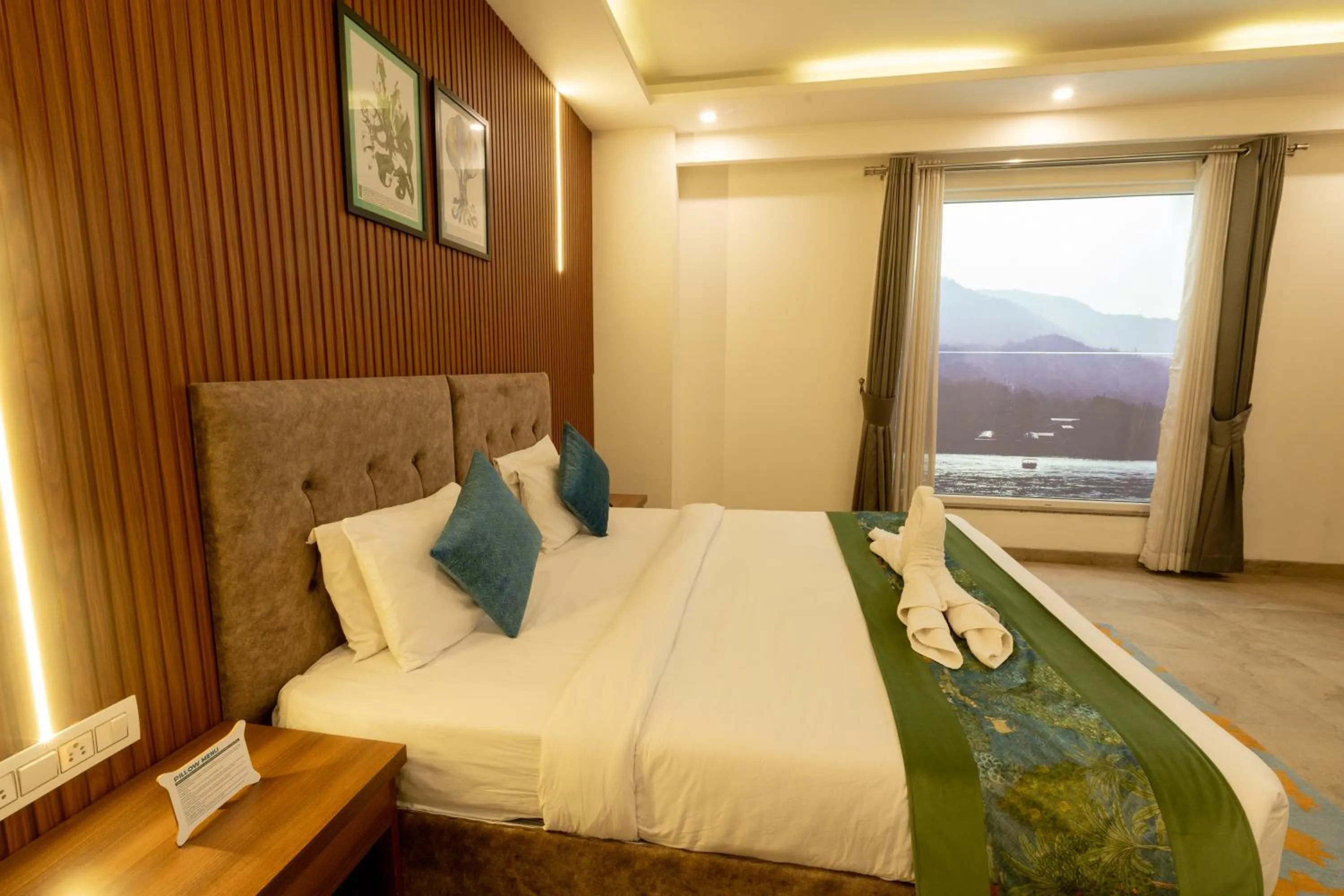 Bed in HOLYWATER Hotel by Ganga Kinare #150 mts from Ganga Ghat Rishikesh