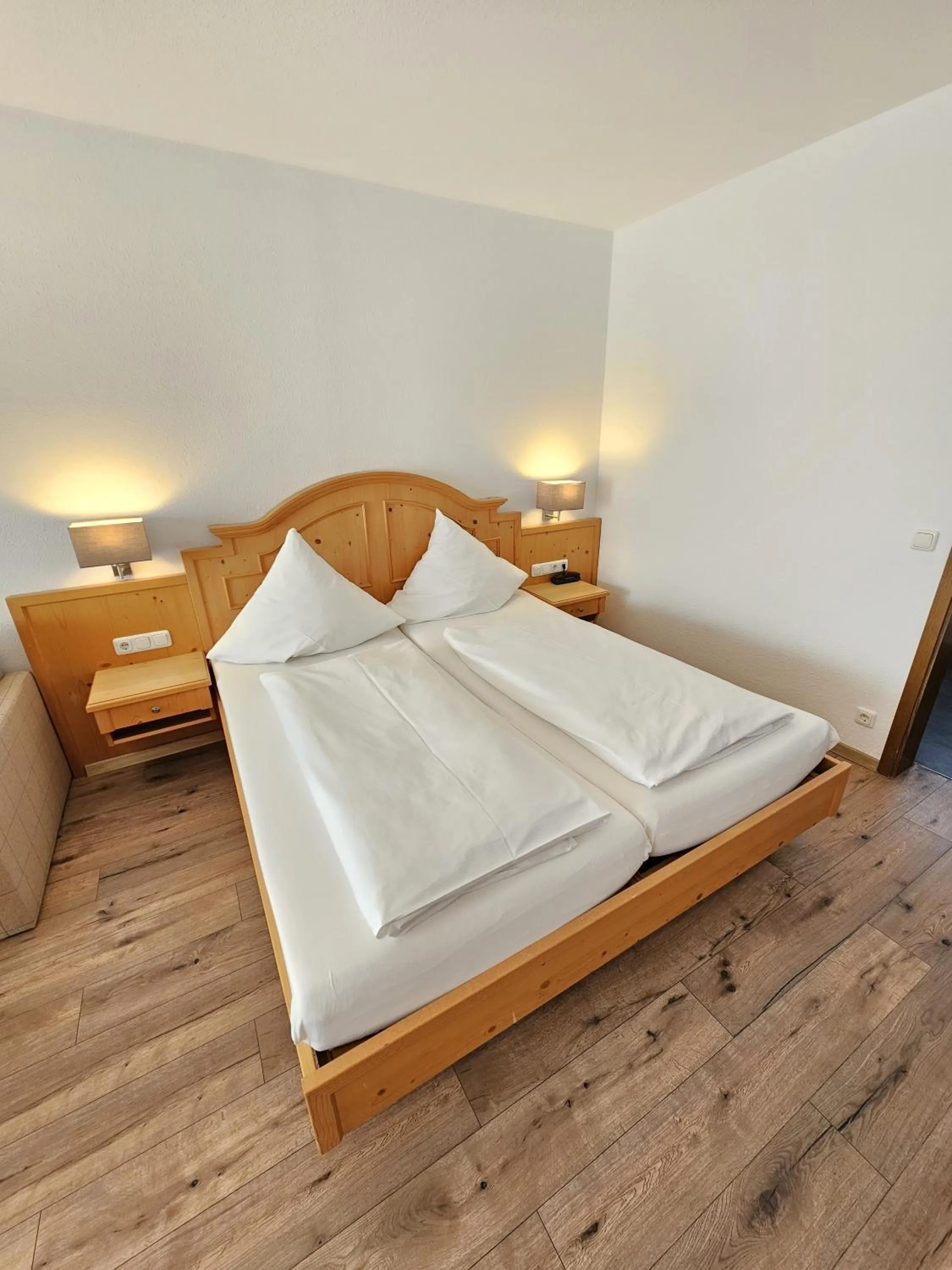 Bed in Hotel Cafe Fuggerhof