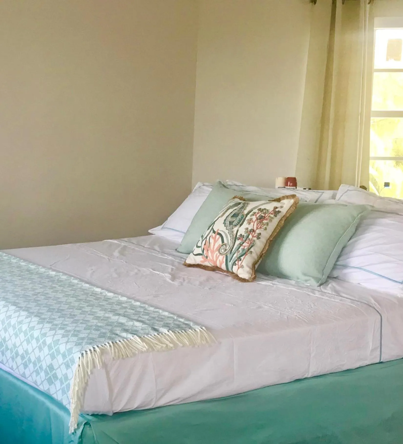 Bed in The Sunset Cove and Rainbow Room