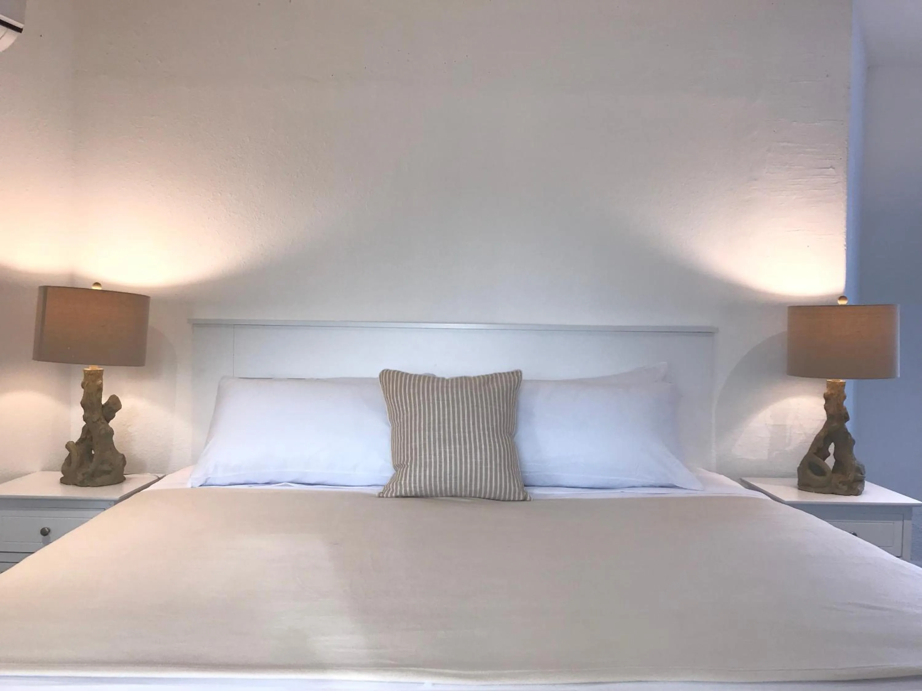 Bed in The Sunset Cove and Rainbow Room