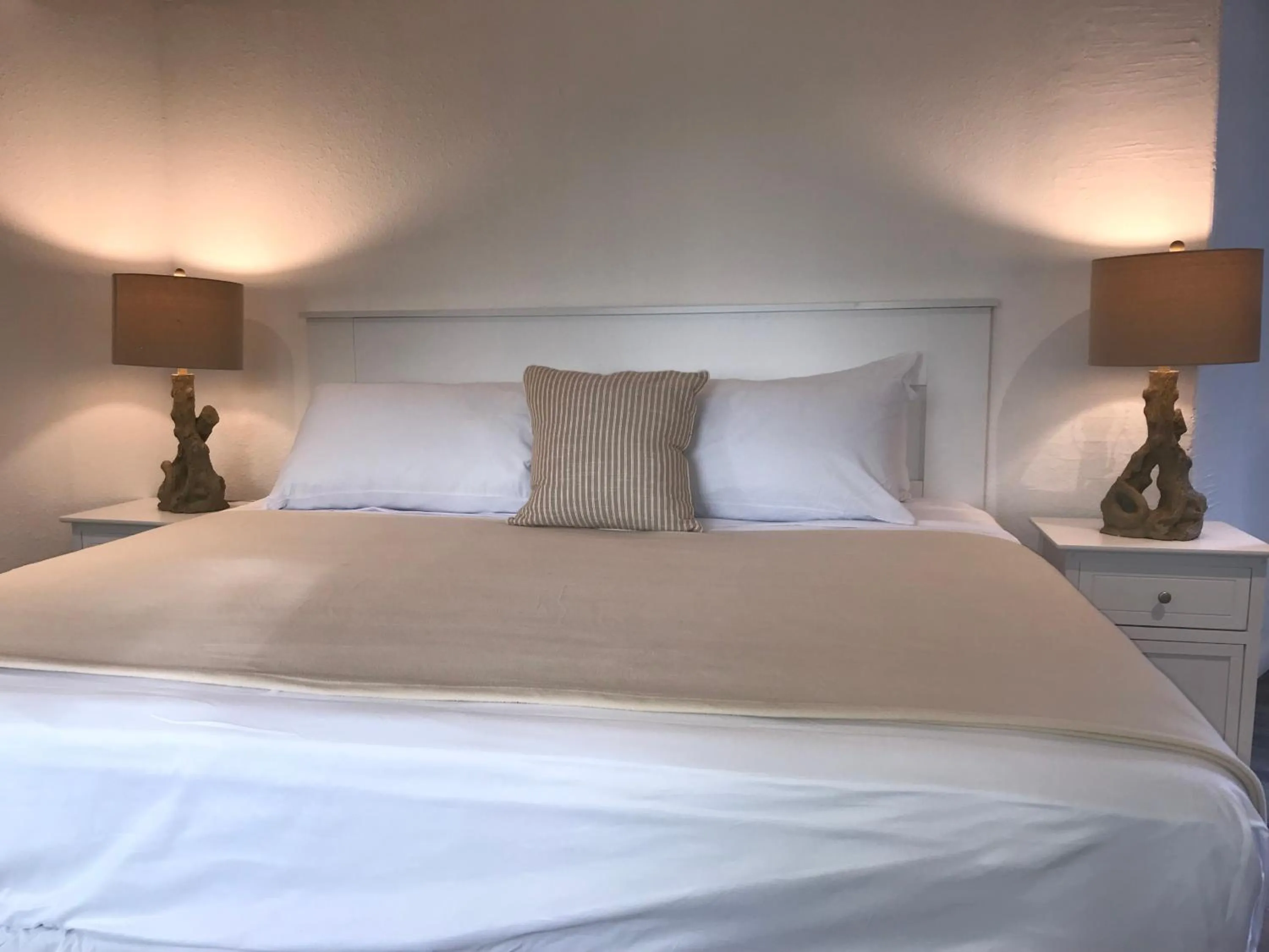 Bed in The Sunset Cove and Rainbow Room