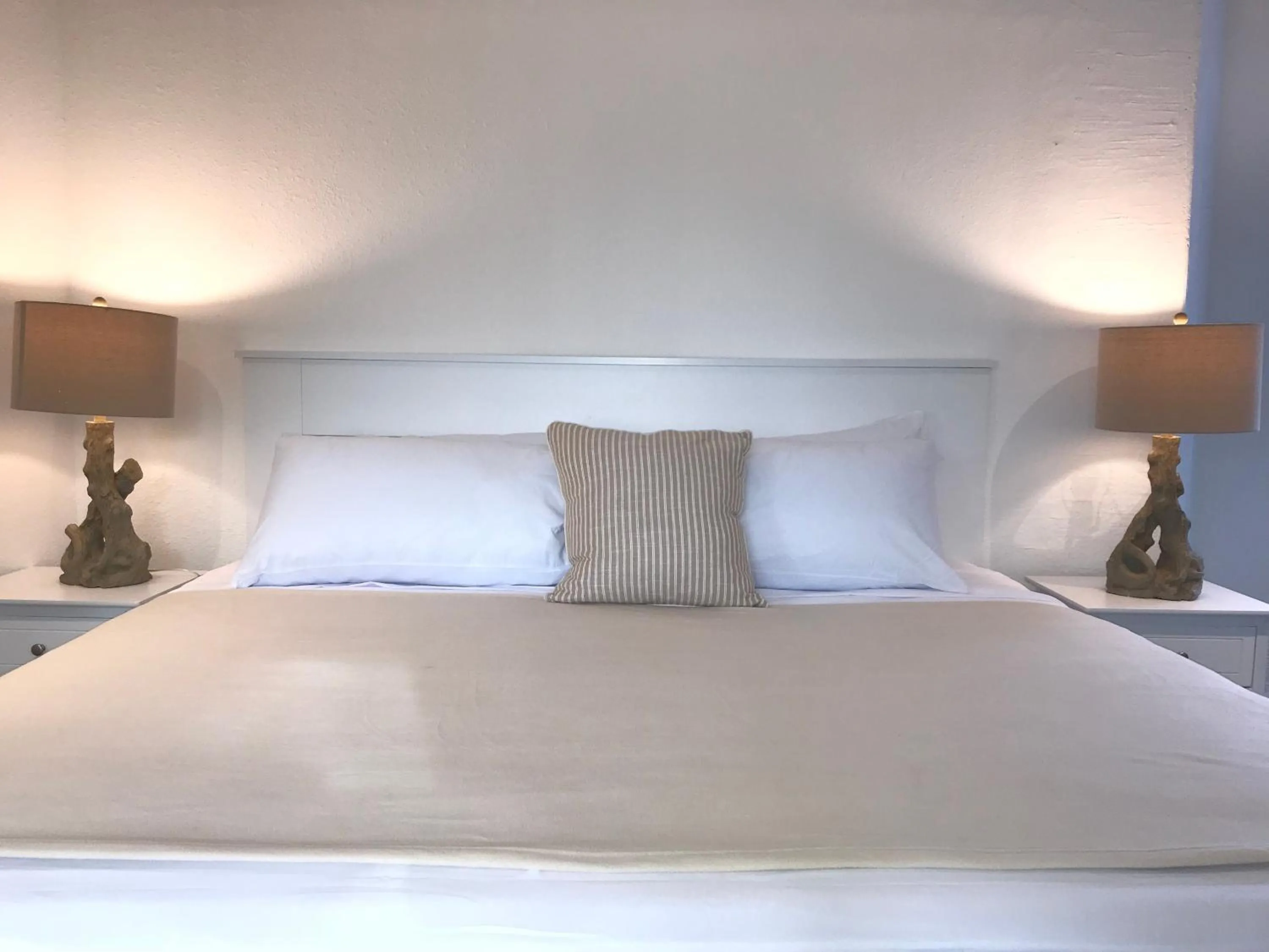 Bed in The Sunset Cove and Rainbow Room