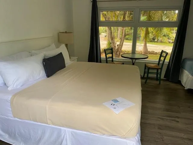 Bed in The Sunset Cove and Rainbow Room