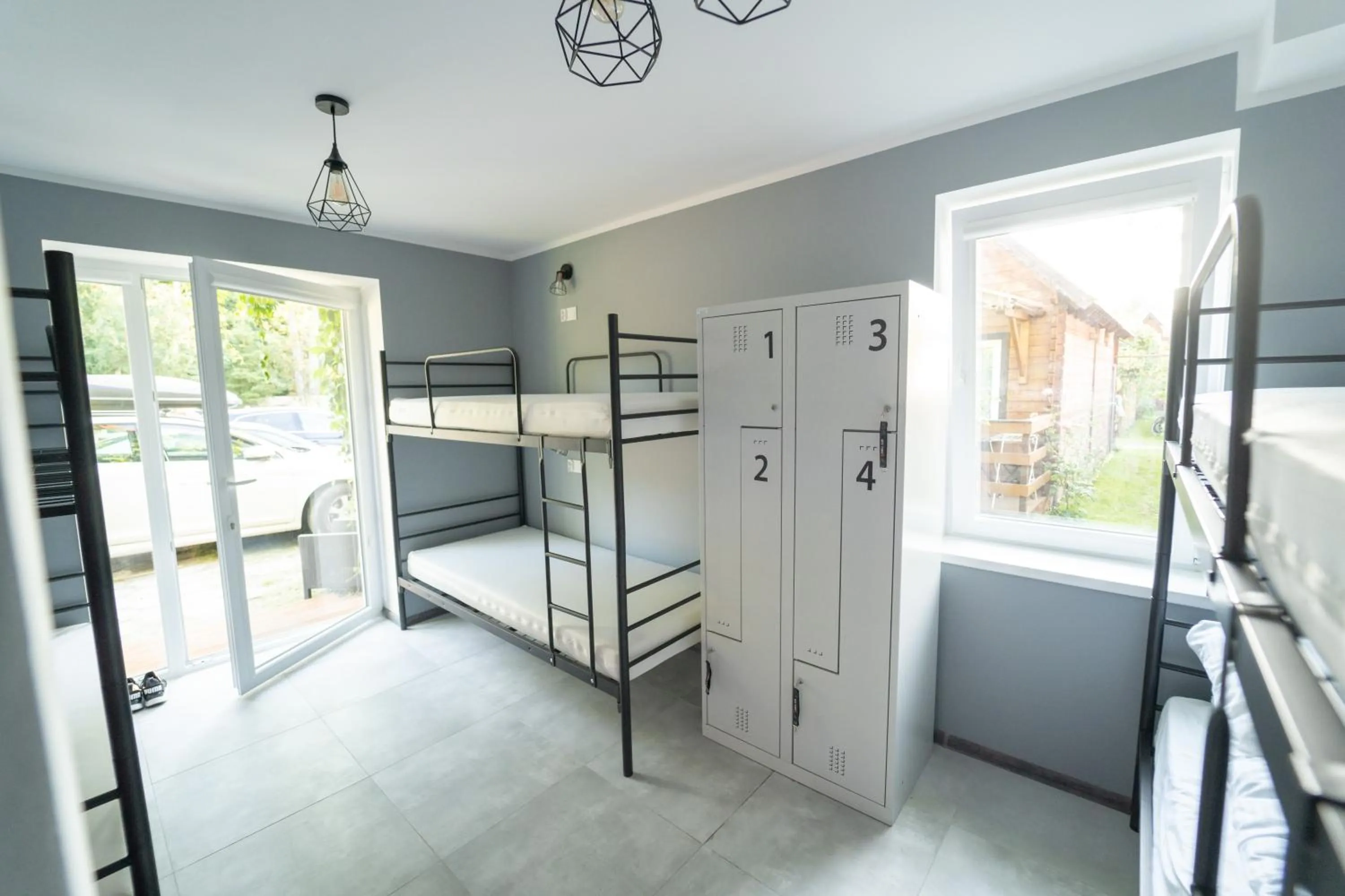 Bed in Pod Cyprysami - surf & family resort