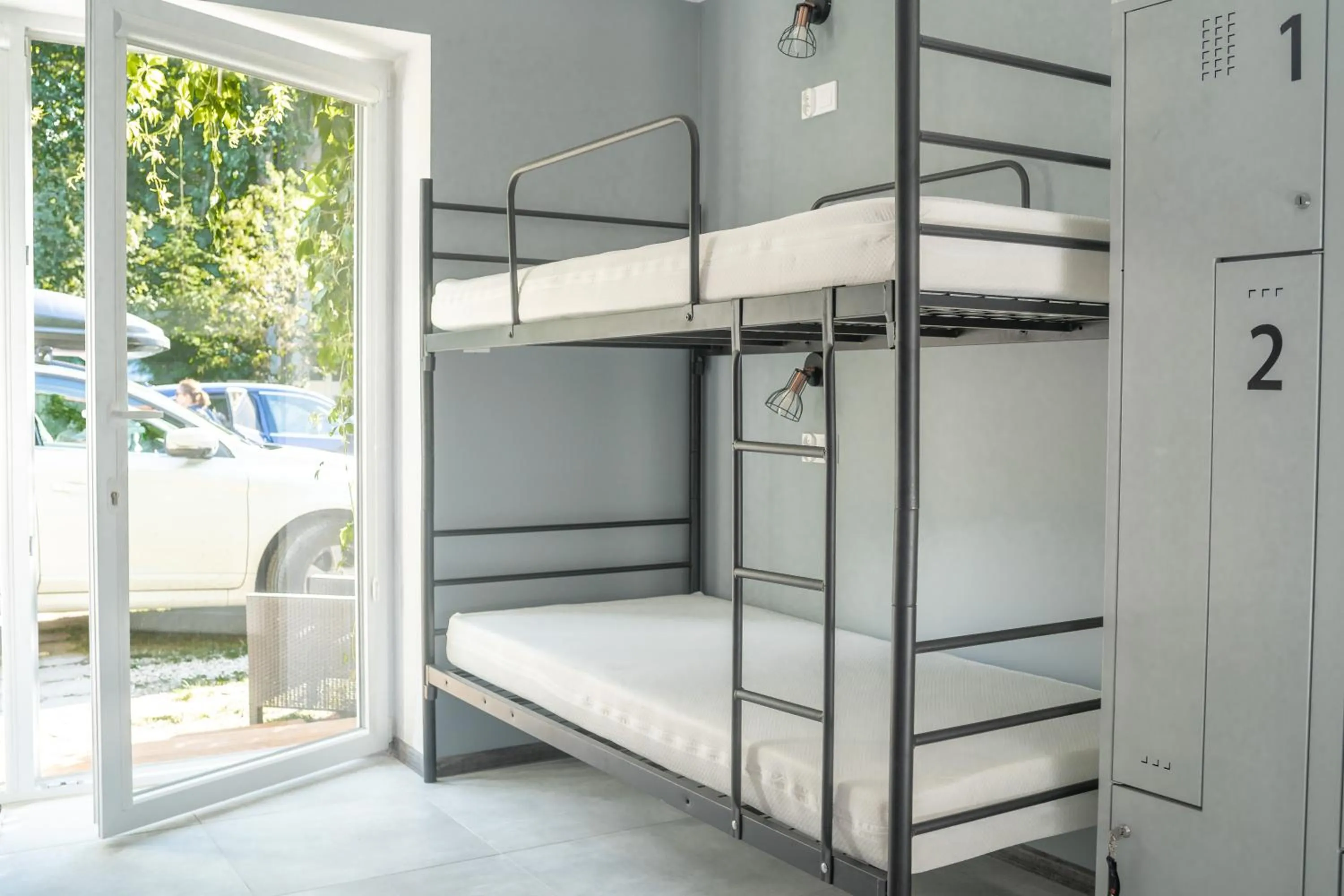 Bed in Pod Cyprysami - surf & family resort