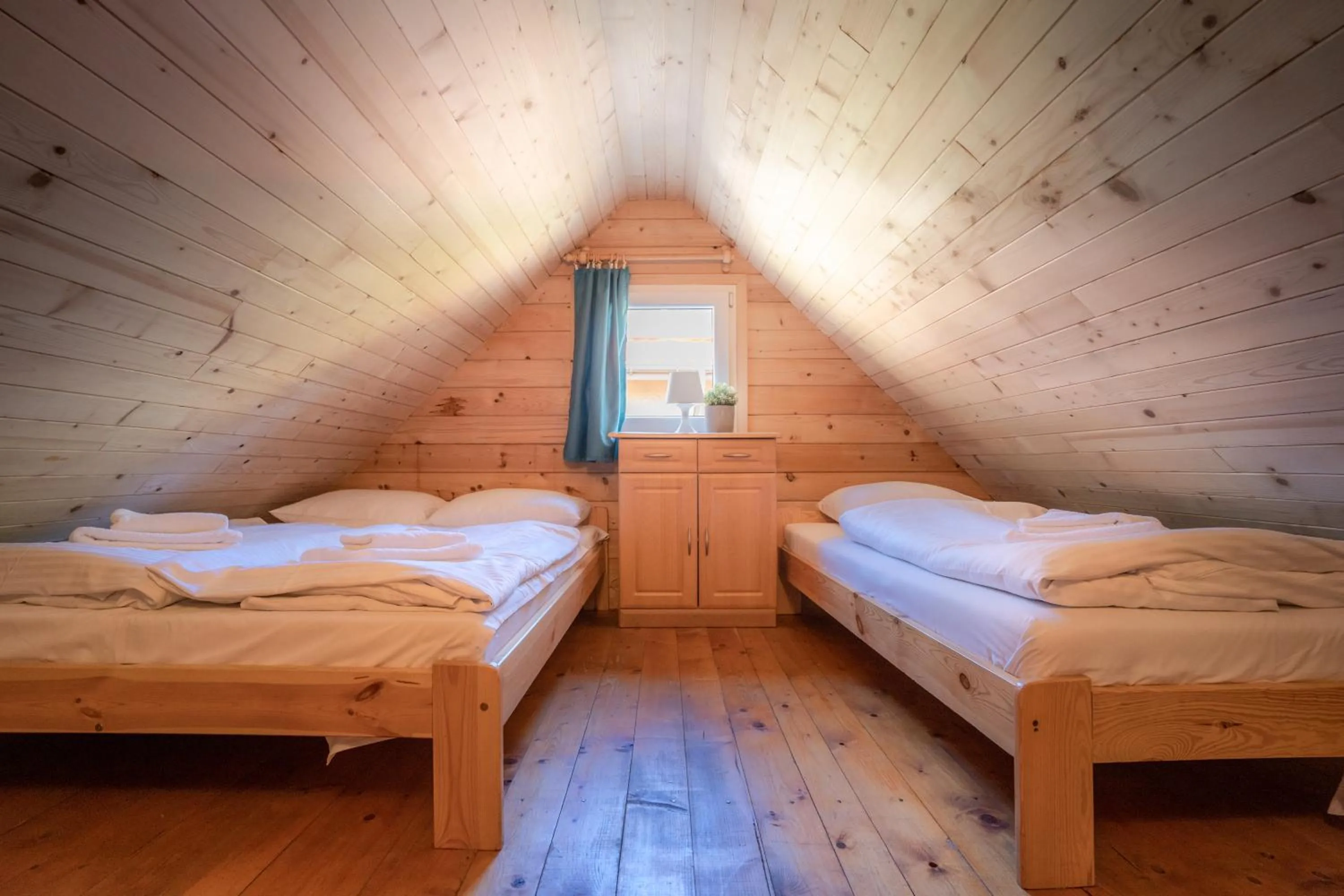 Bed in Pod Cyprysami - surf & family resort