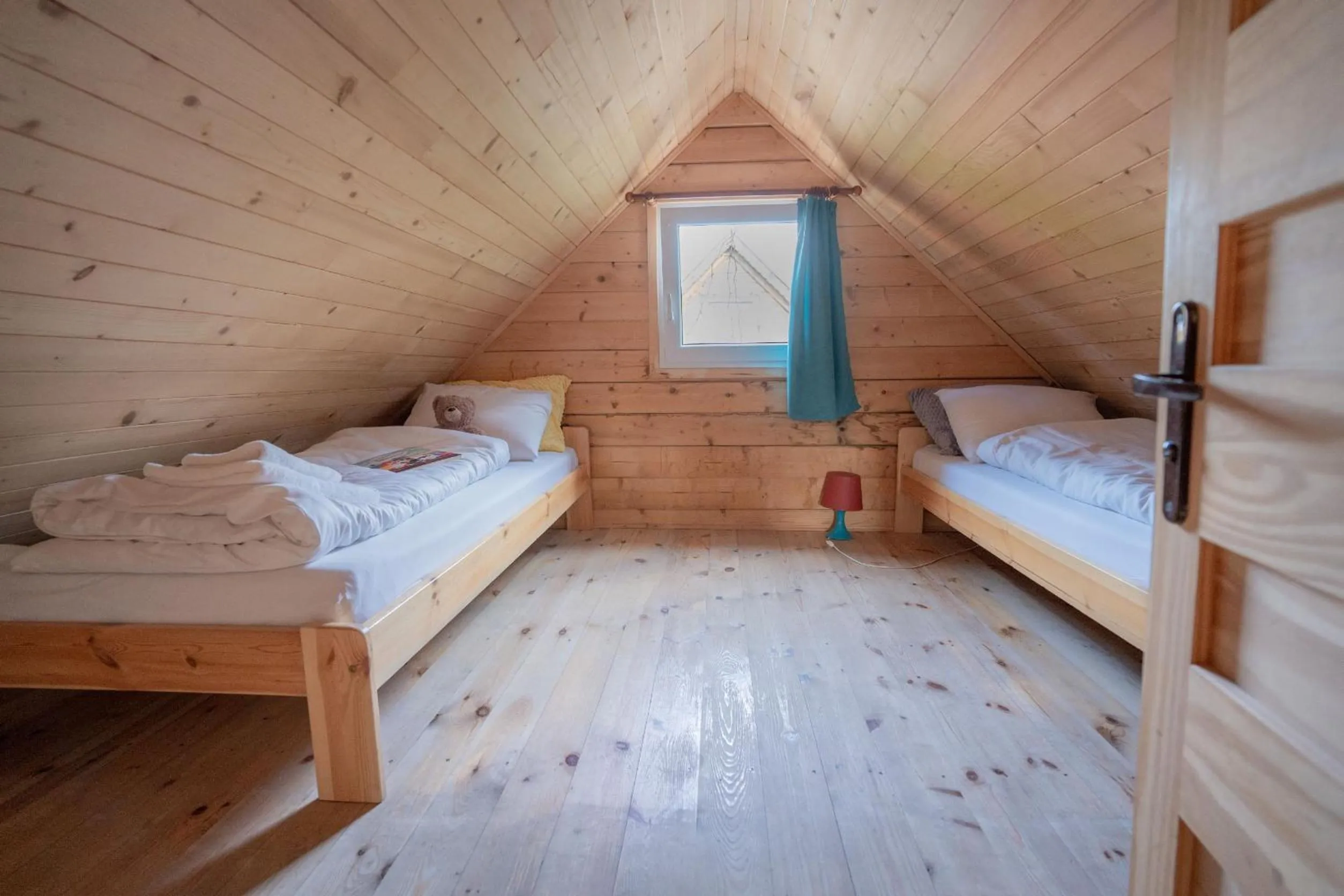 Bed in Pod Cyprysami - surf & family resort
