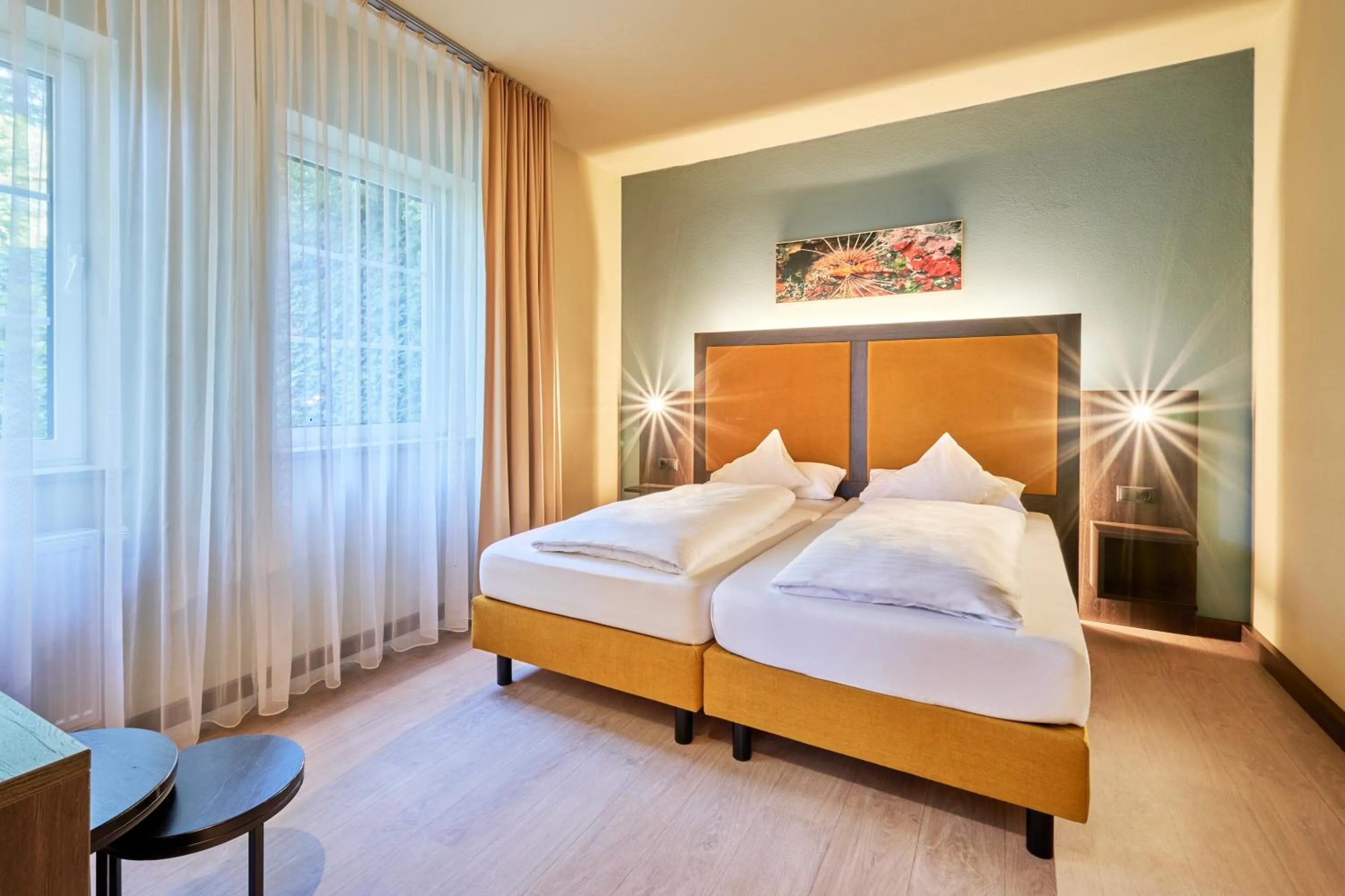 Photo of the whole room, Bed in AKZENT Hotel Aufkirchen