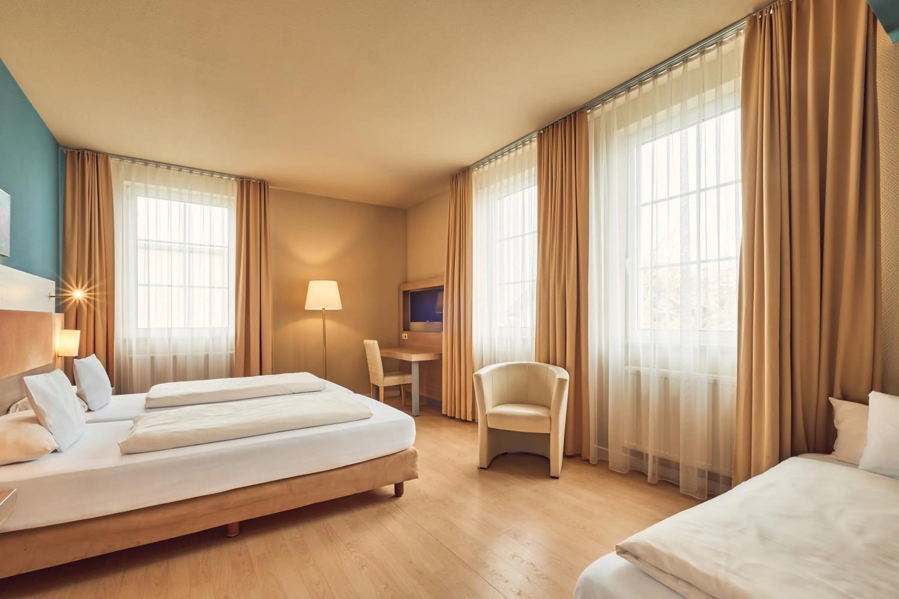 Photo of the whole room, Bed in AKZENT Hotel Aufkirchen