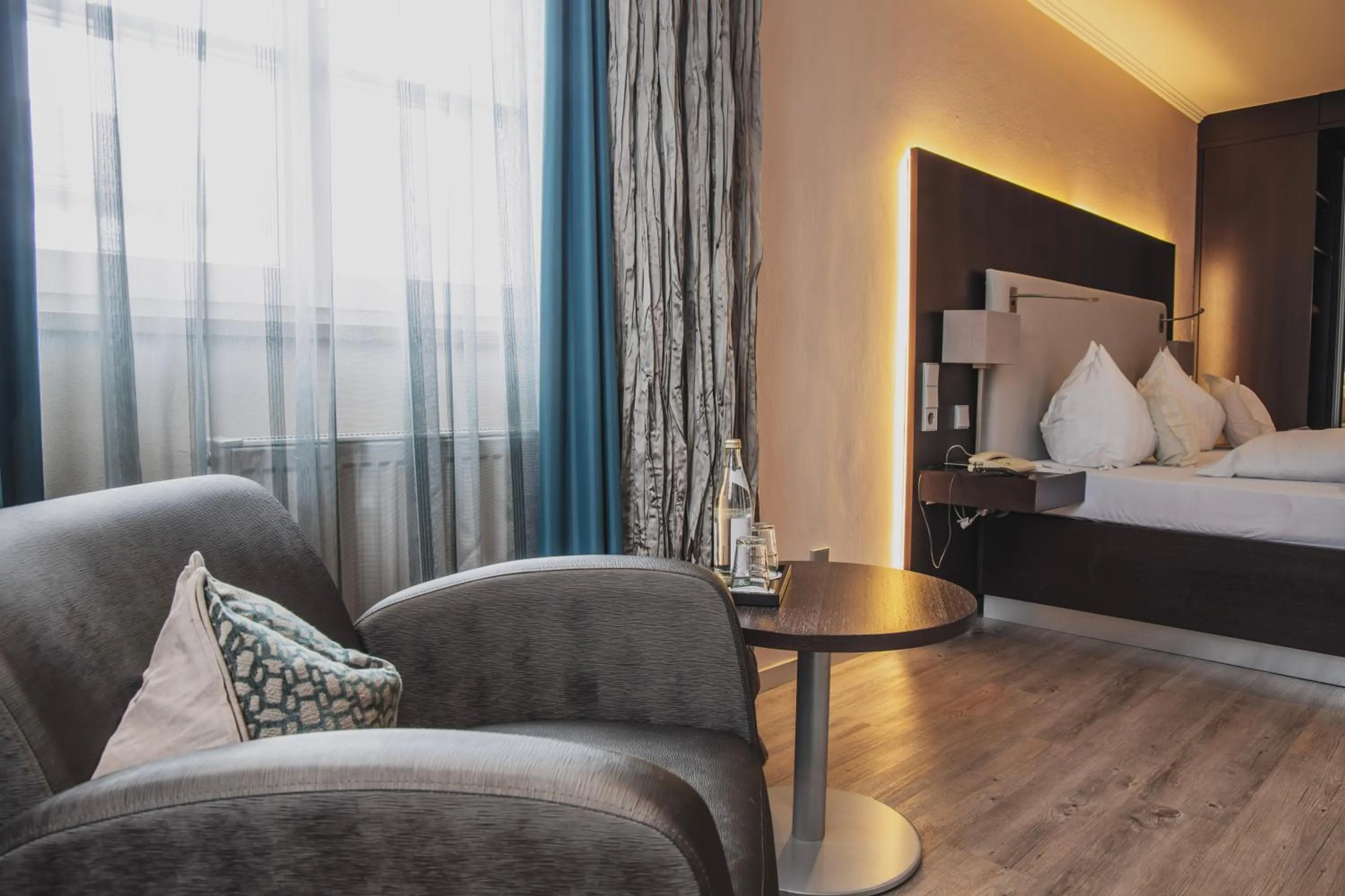 Living room, Bed in Hotel Residenz Passau