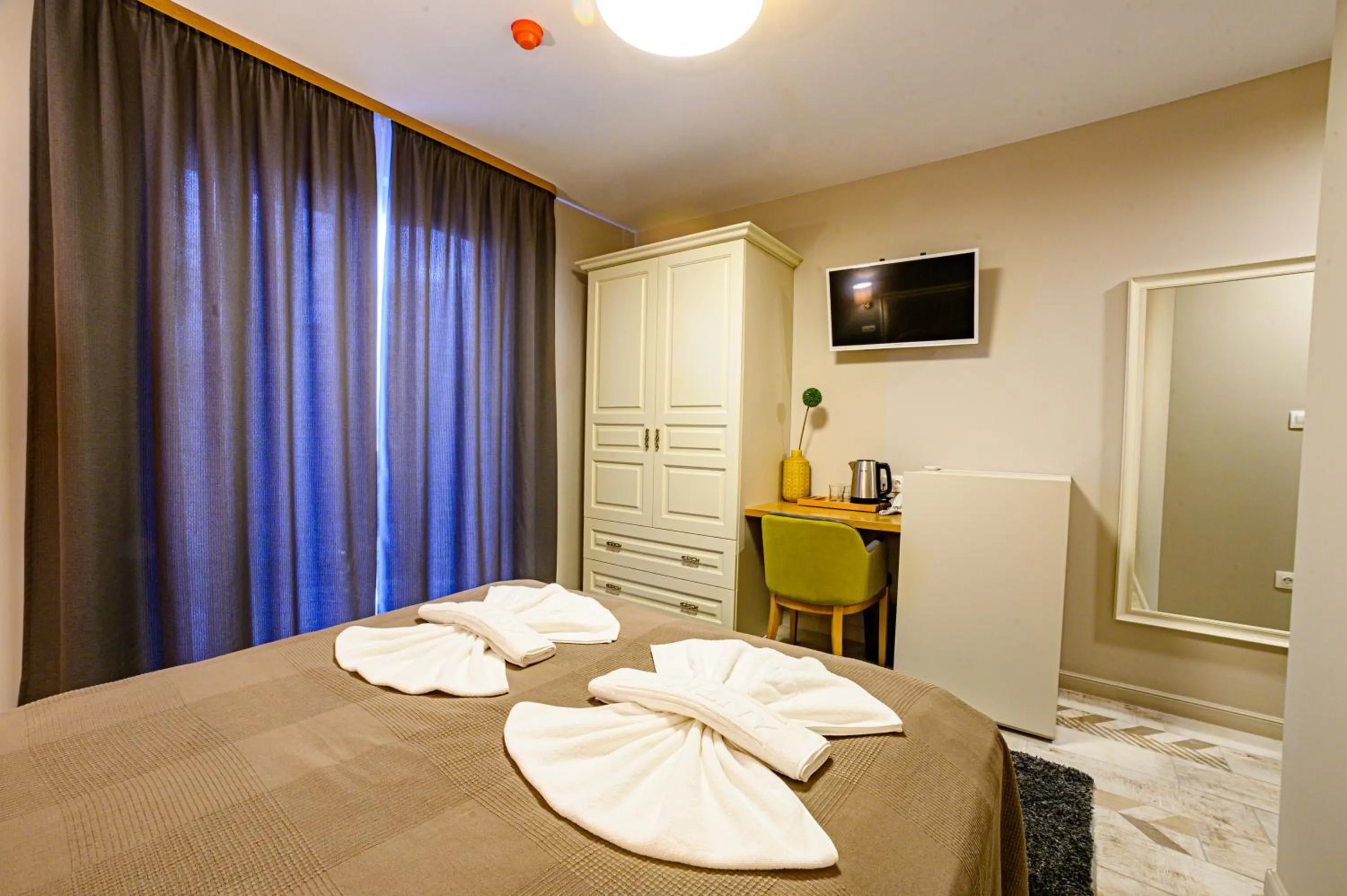 Bed in Antique Boutique Hotel