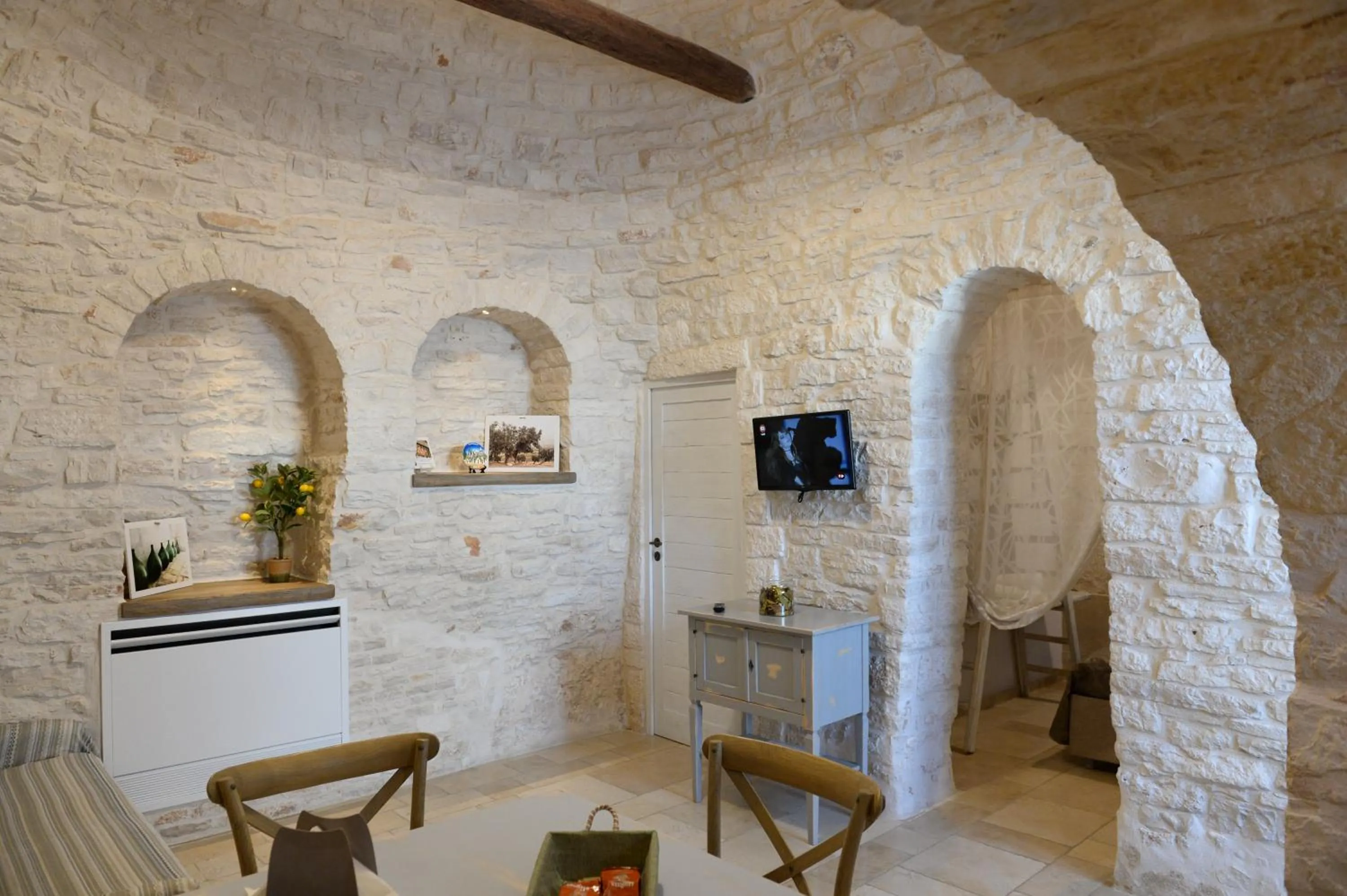 Living room in Trullo A Casedd