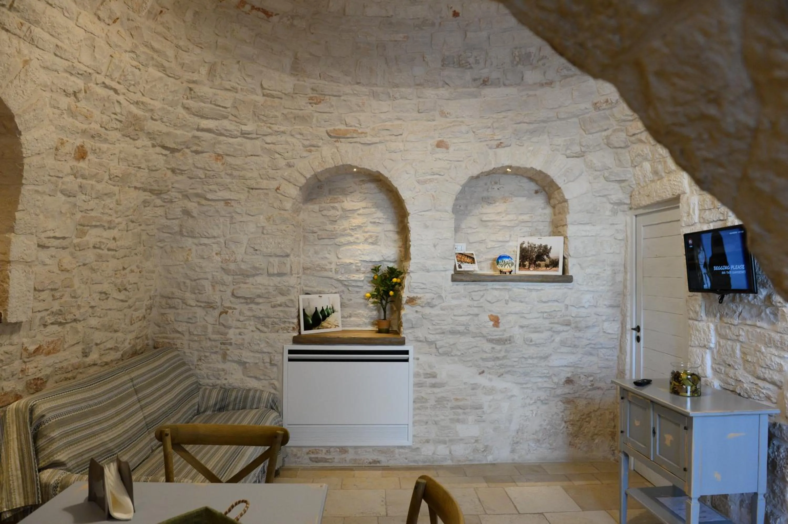 Living room in Trullo A Casedd