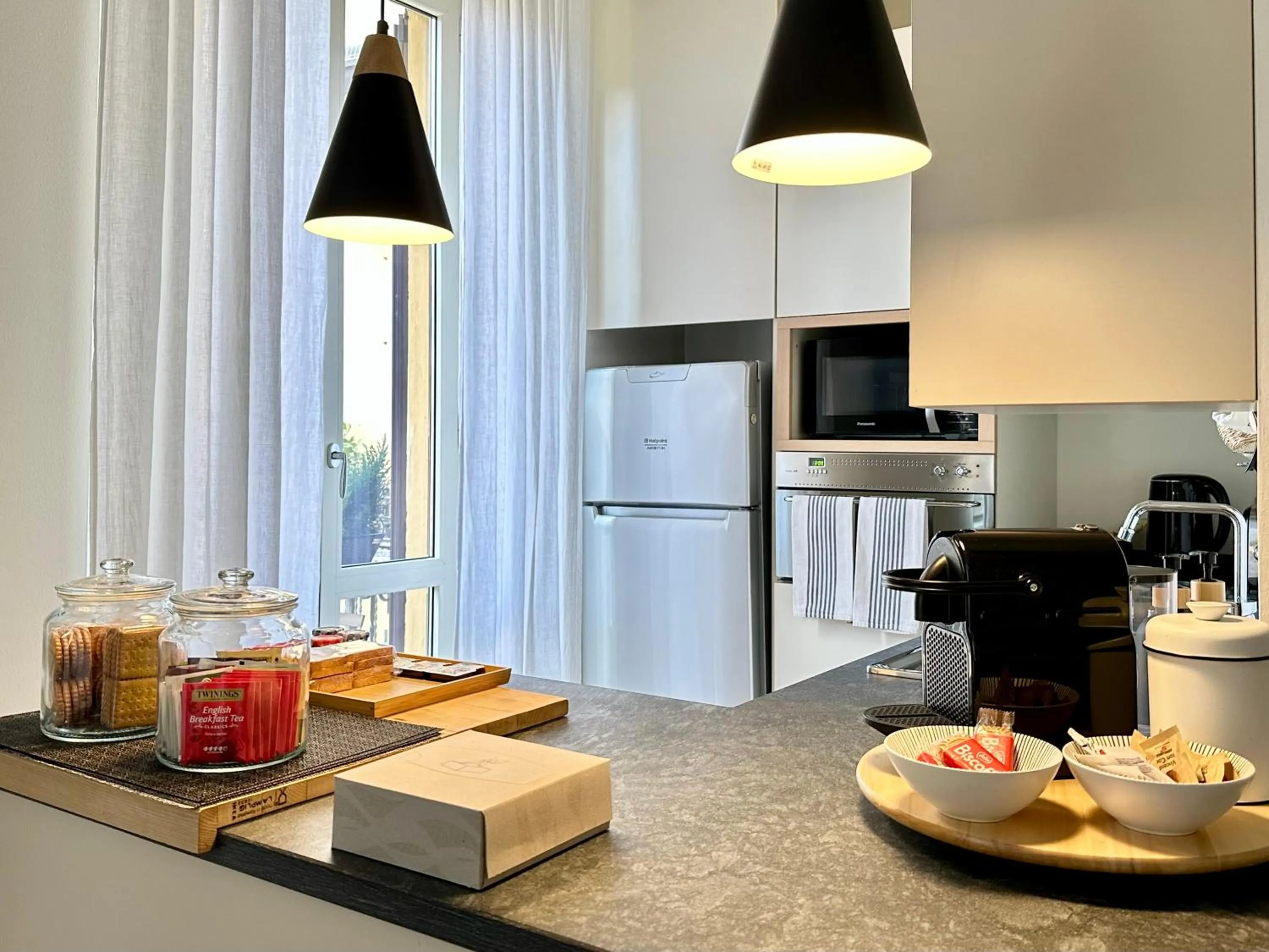 Kitchen or kitchenette in Lily Pads -Elegant apartment- in the city center