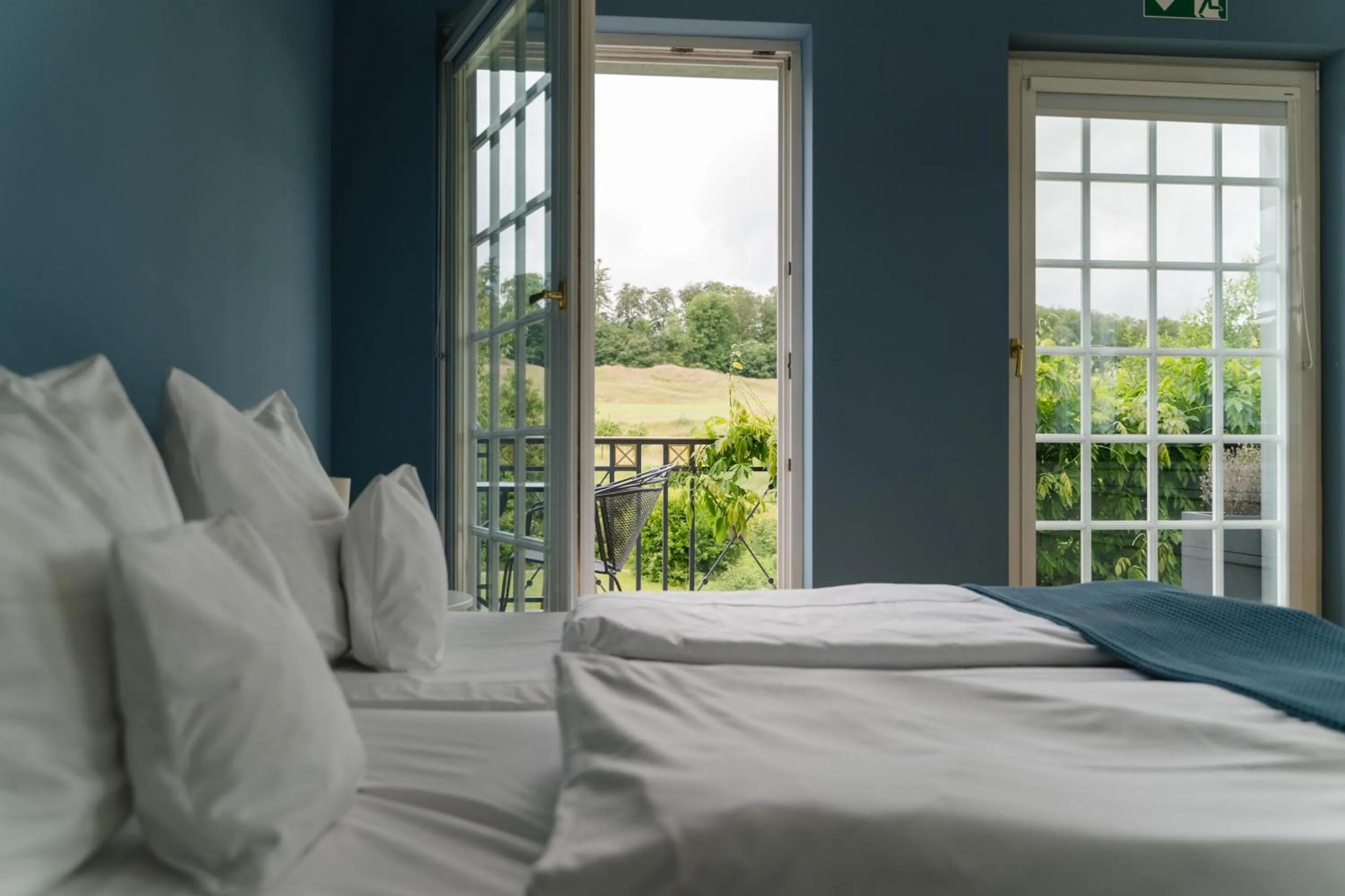 Photo of the whole room, Bed in Hotel Hofgut Georgenthal
