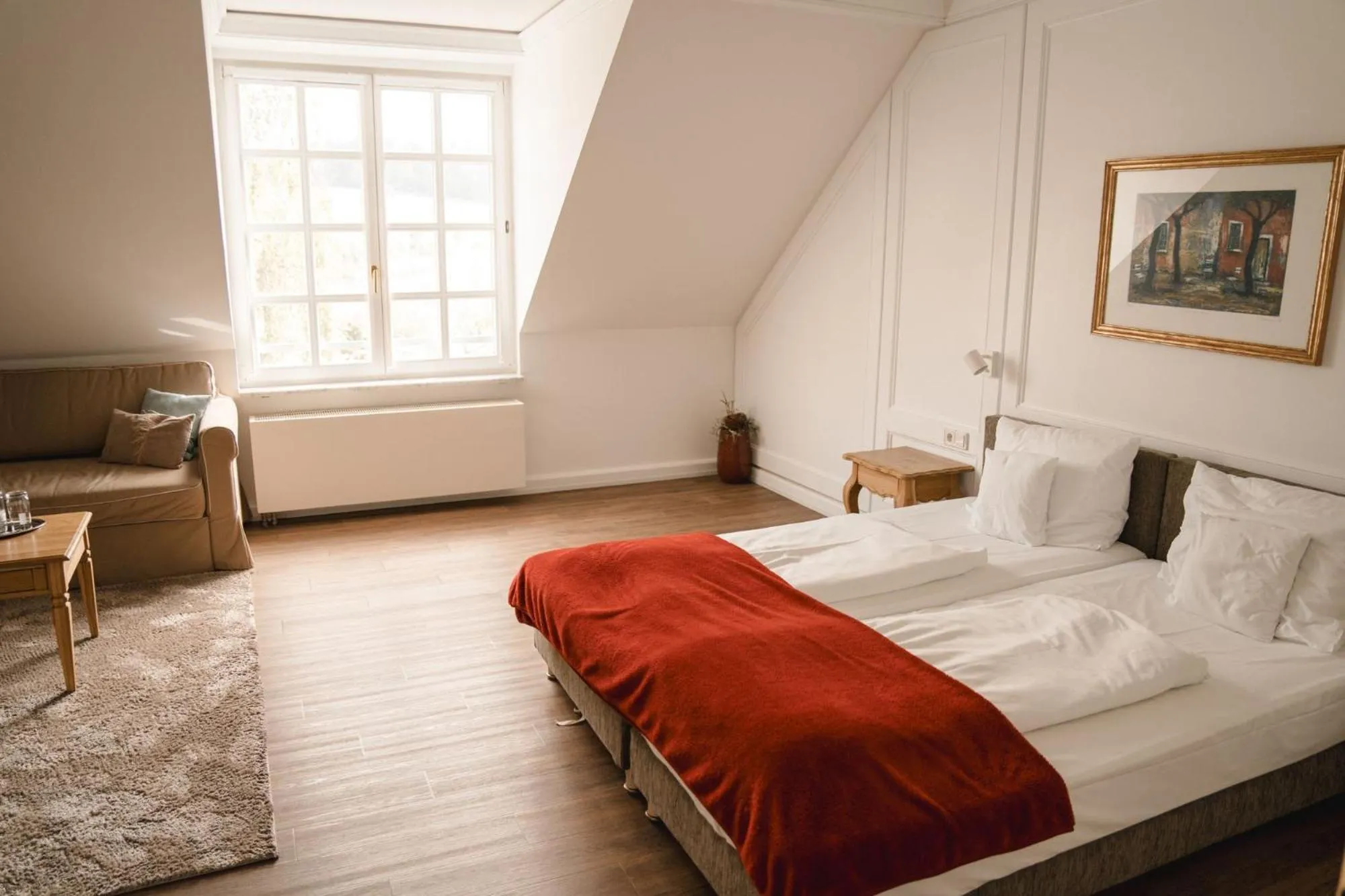 Bed in Hotel Hofgut Georgenthal