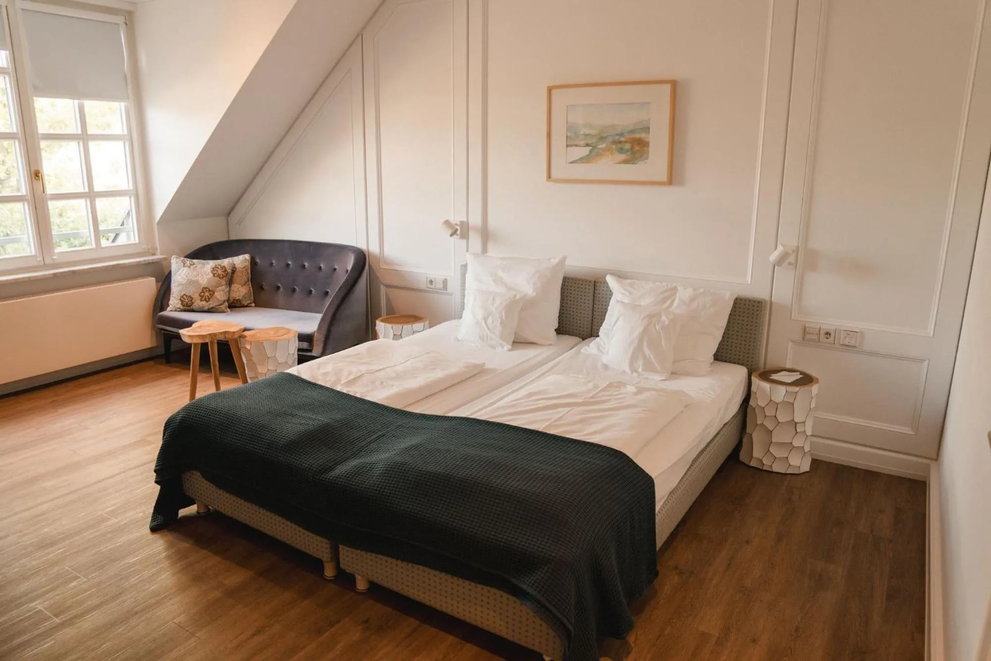 Bed in Hotel Hofgut Georgenthal