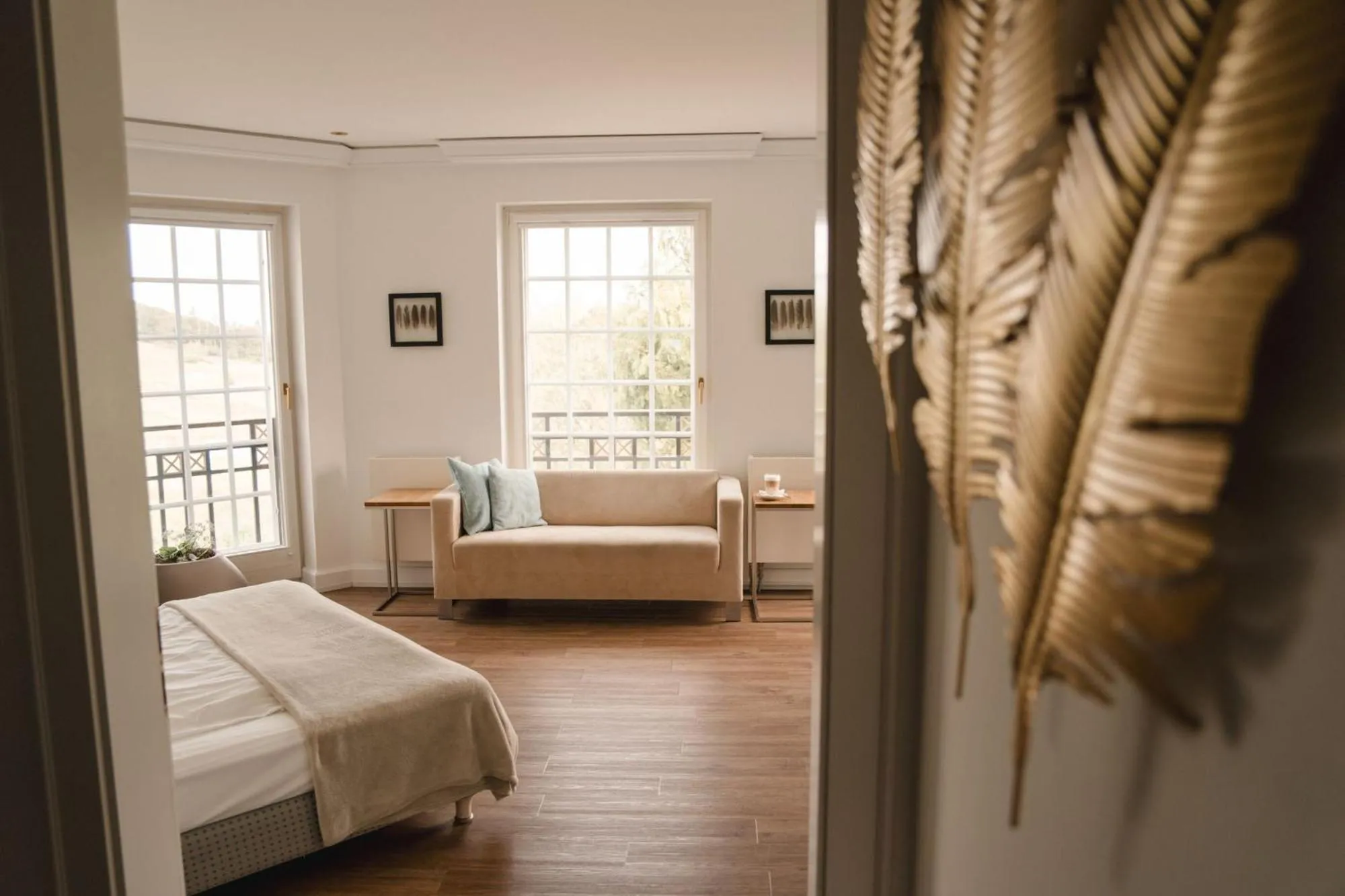 Bed in Hotel Hofgut Georgenthal