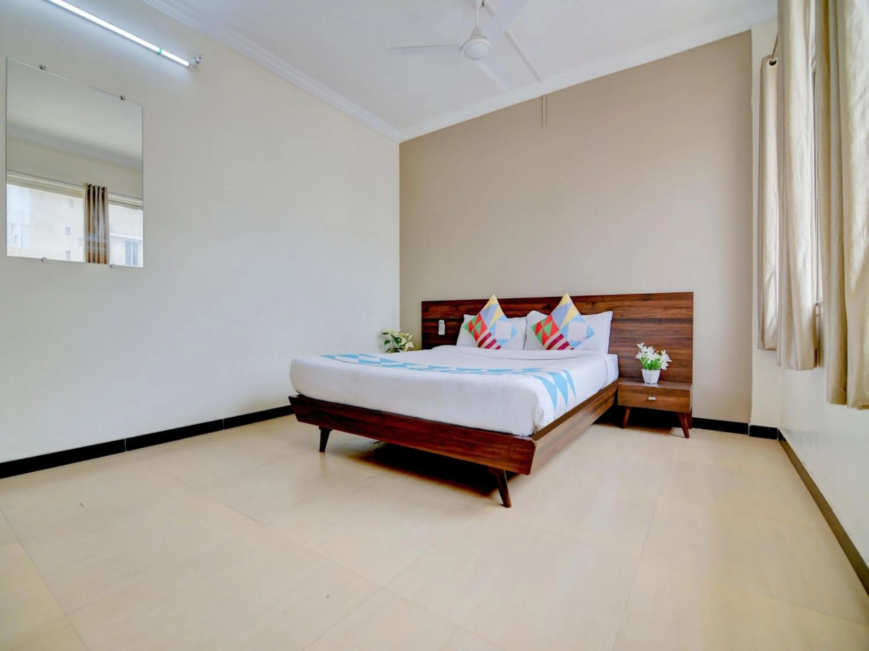 Bedroom in Hotel O Peaceful Stay Keshav Nagar.