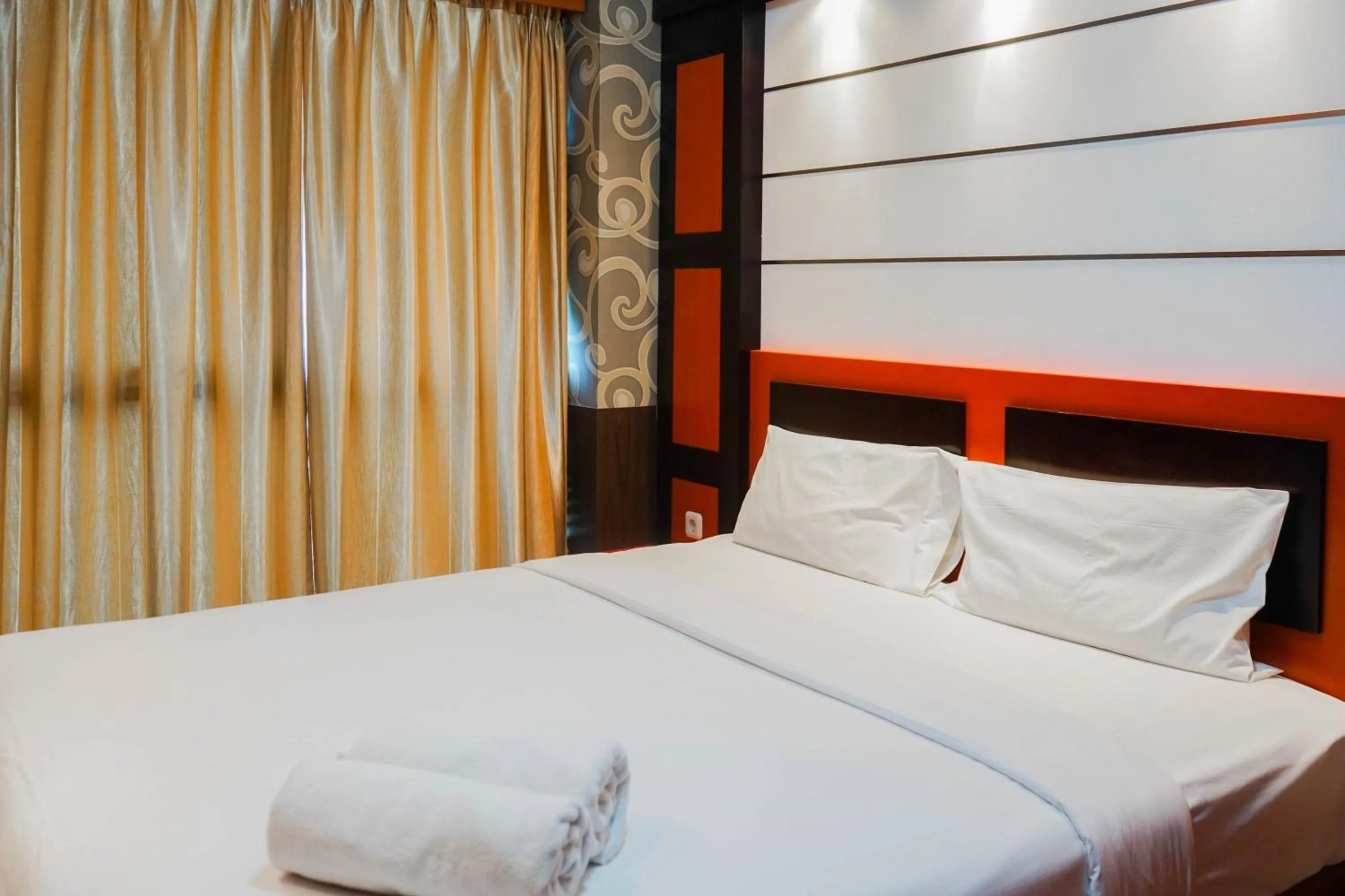 Bed in Best Price 2BR at Tifolia Apartment By Travelio