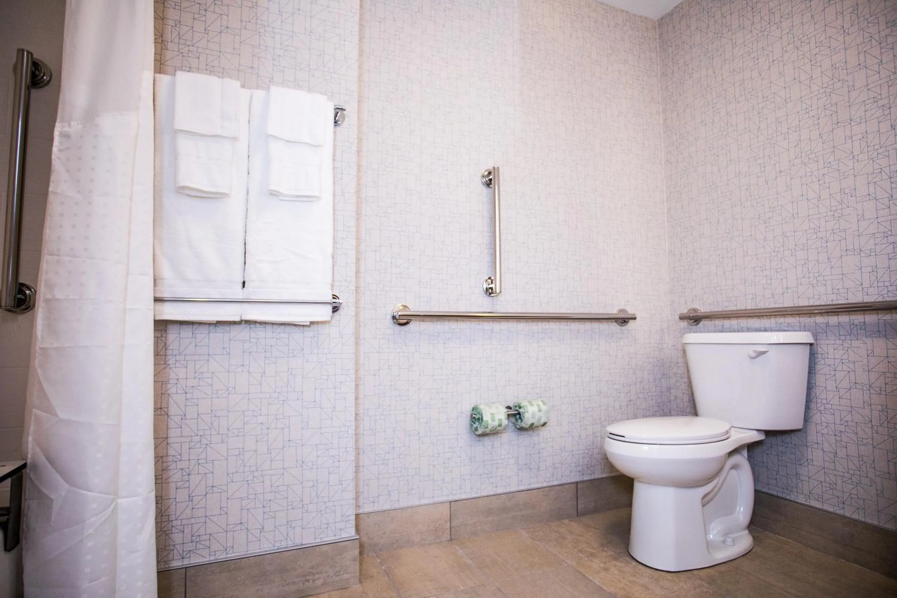 Toilet in Holiday Inn Express & Suites Rehoboth Beach by IHG