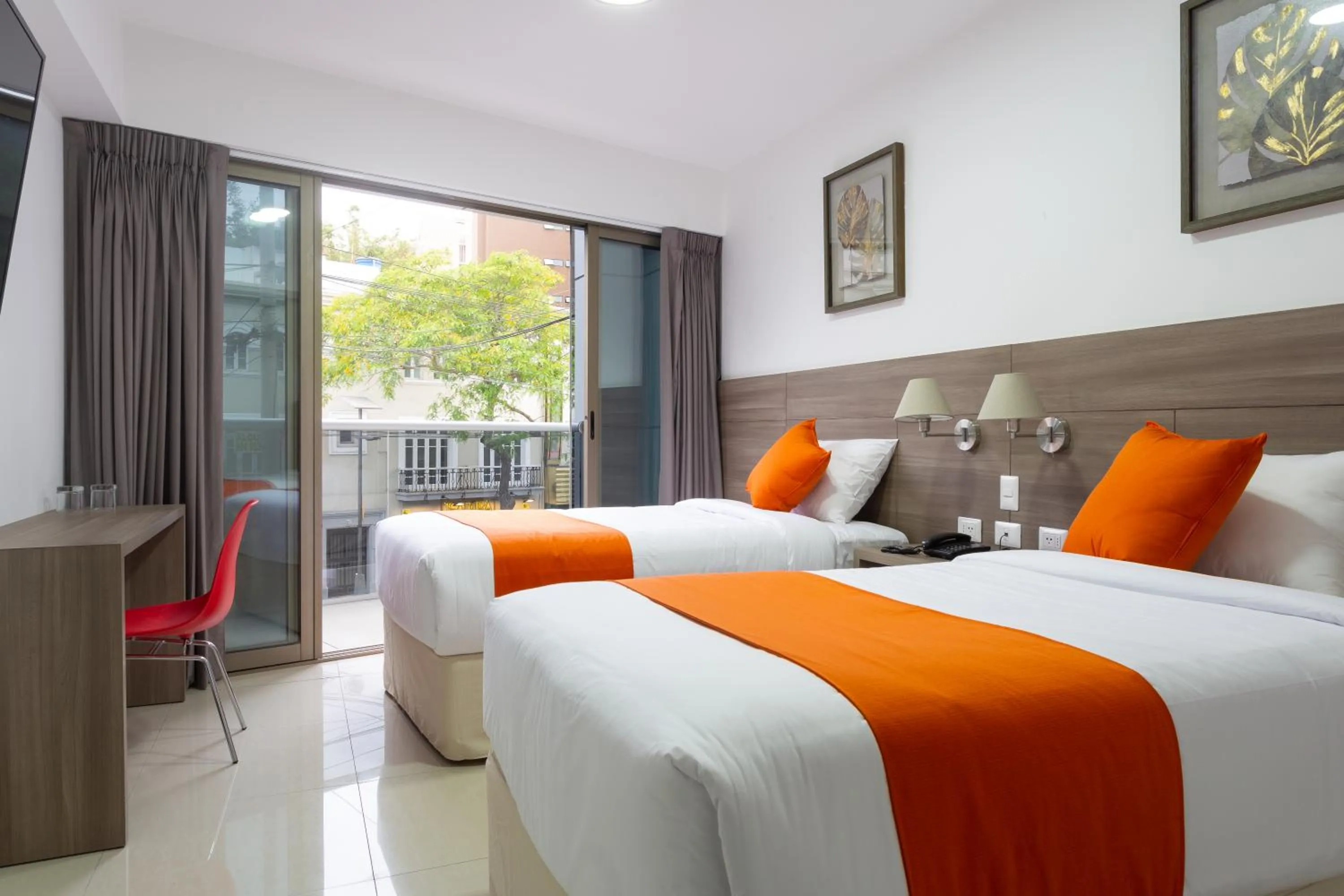 Bed in Howard Johnson by Wyndham Lima Miraflores Art House