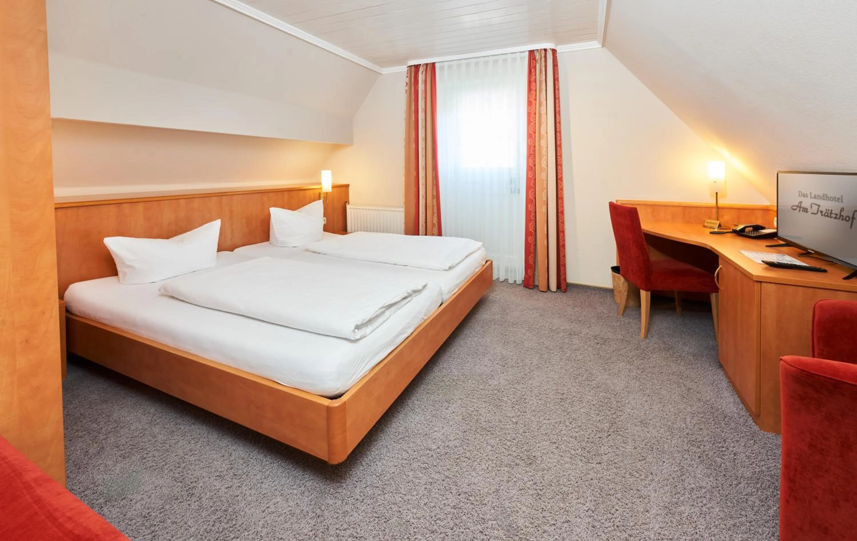 Bed in Das Landhotel am Trätzhof Fulda
