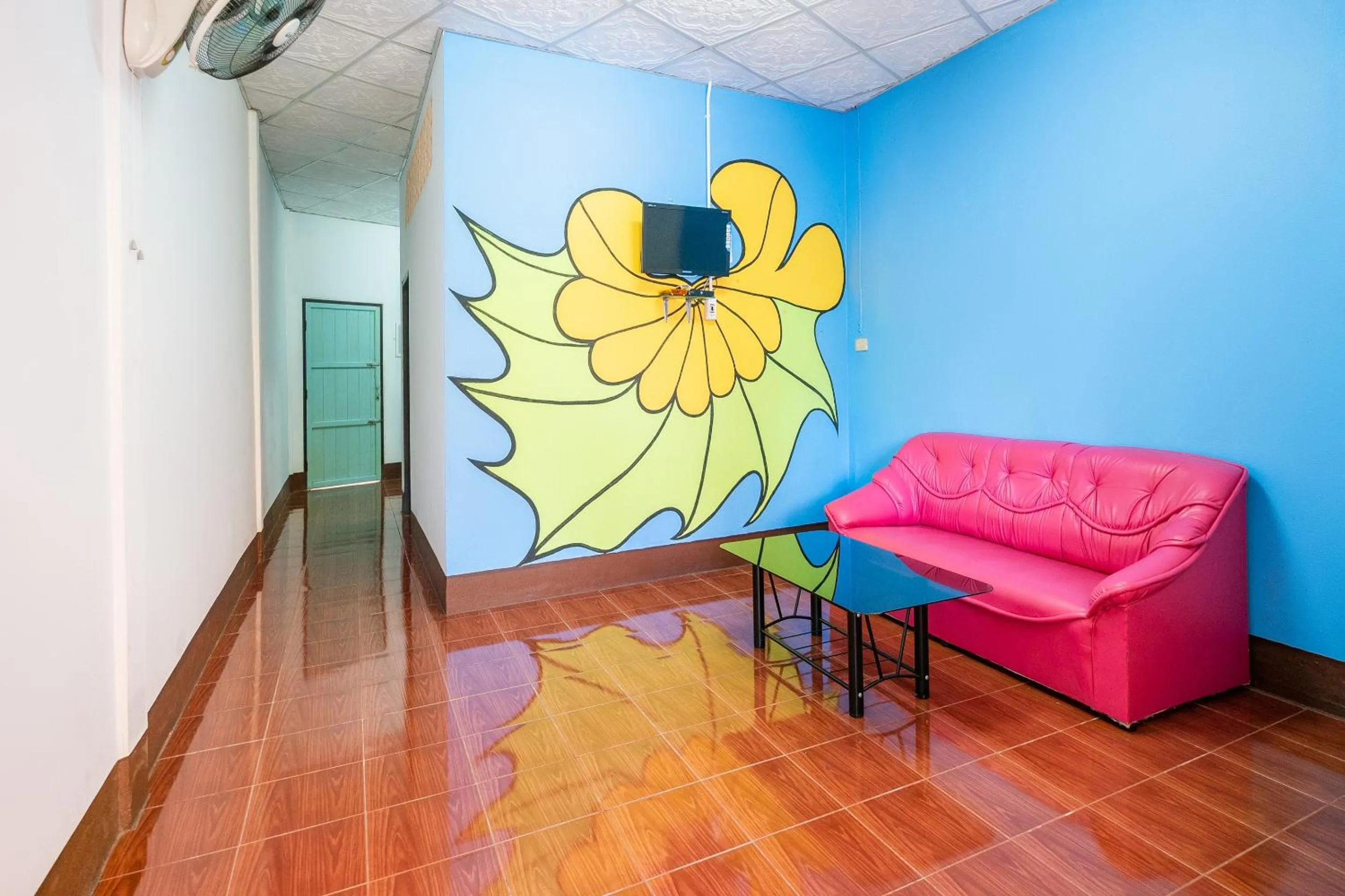 Living room in OYO 608 Maleena Home