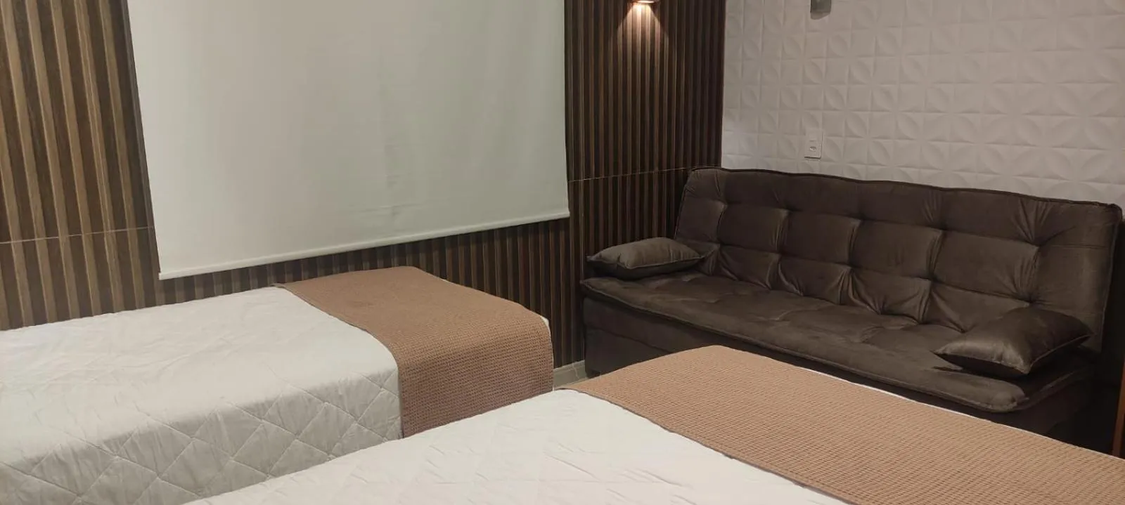 Bed in Pousada Costa Doce