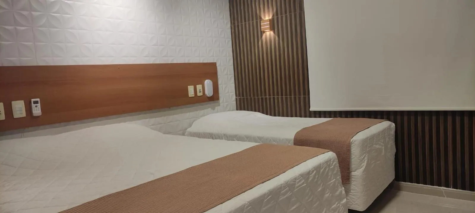 Bed in Pousada Costa Doce