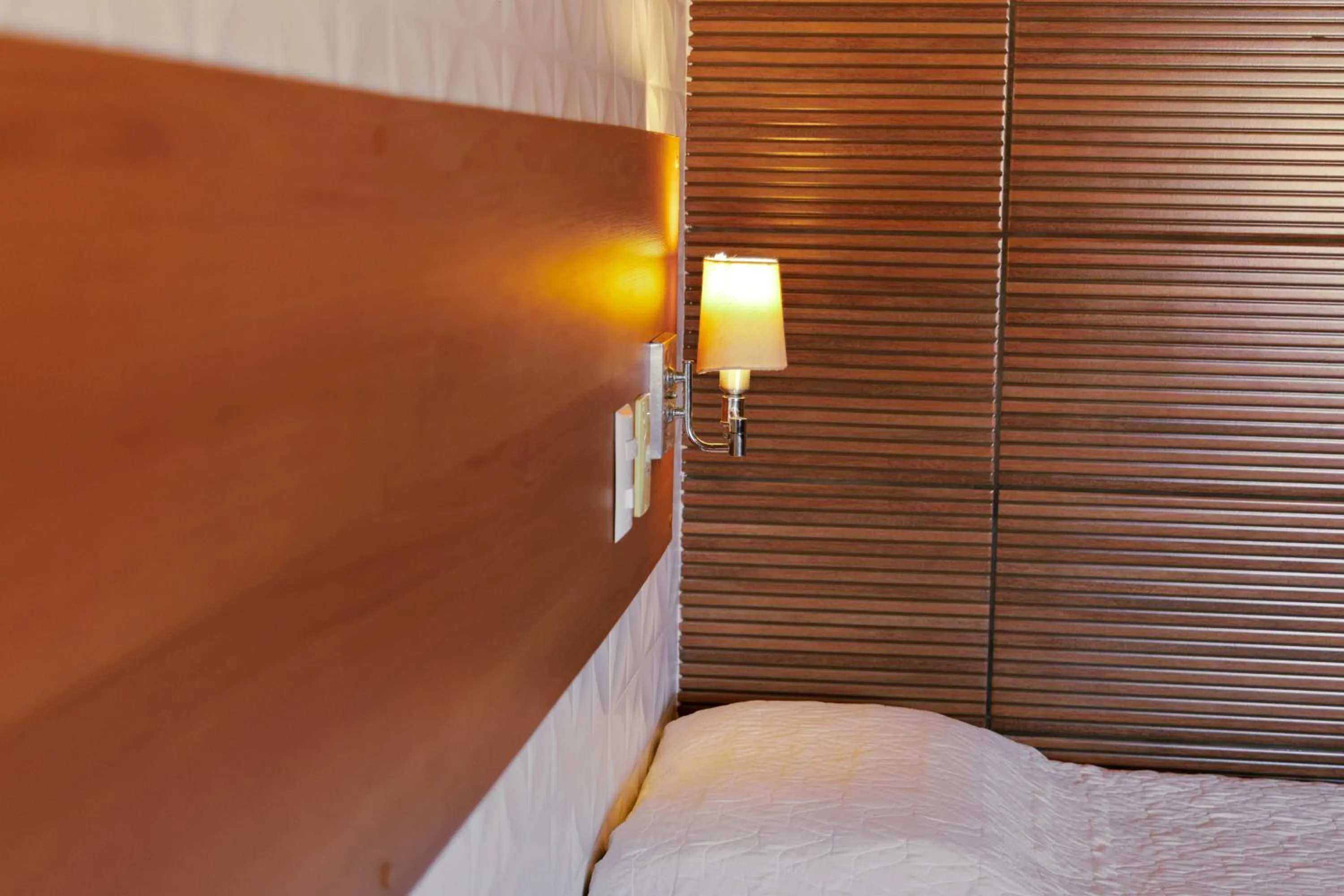 Bed in Pousada Costa Doce