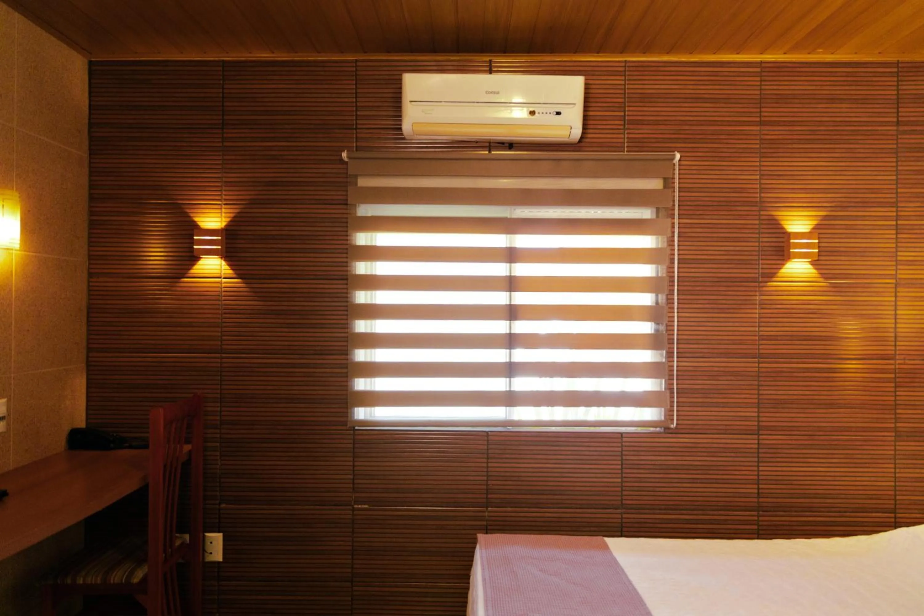 Bed in Pousada Costa Doce